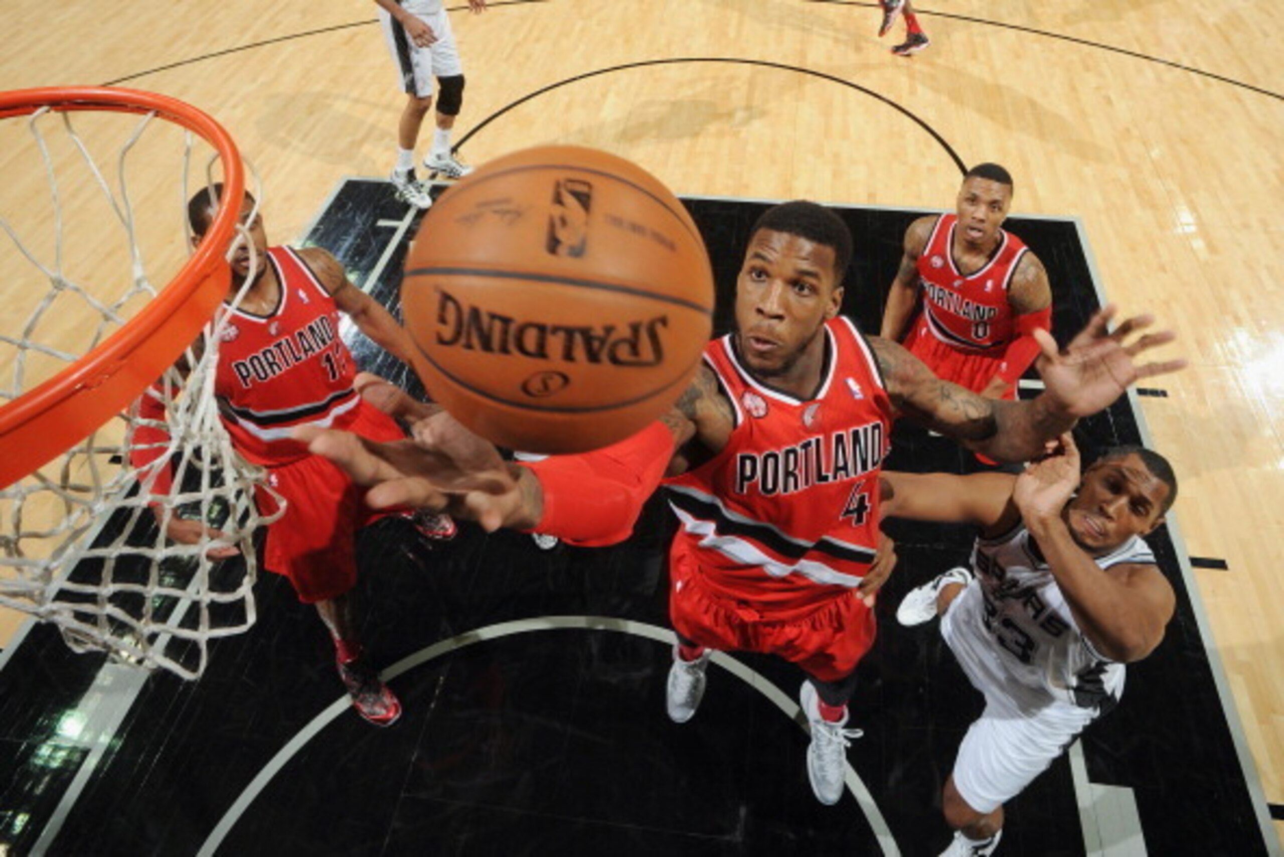 SAN ANTONIO, TX - MAY 14: Thomas Robinson #41 of the Portland Trail Blazers rebounds against the San Antonio Spurs in Game Five of the Western Conference Semifinals during the 2014 NBA Playoffs on May 14, 2014 at the AT&T Center in San Antonio, Texas. NOT