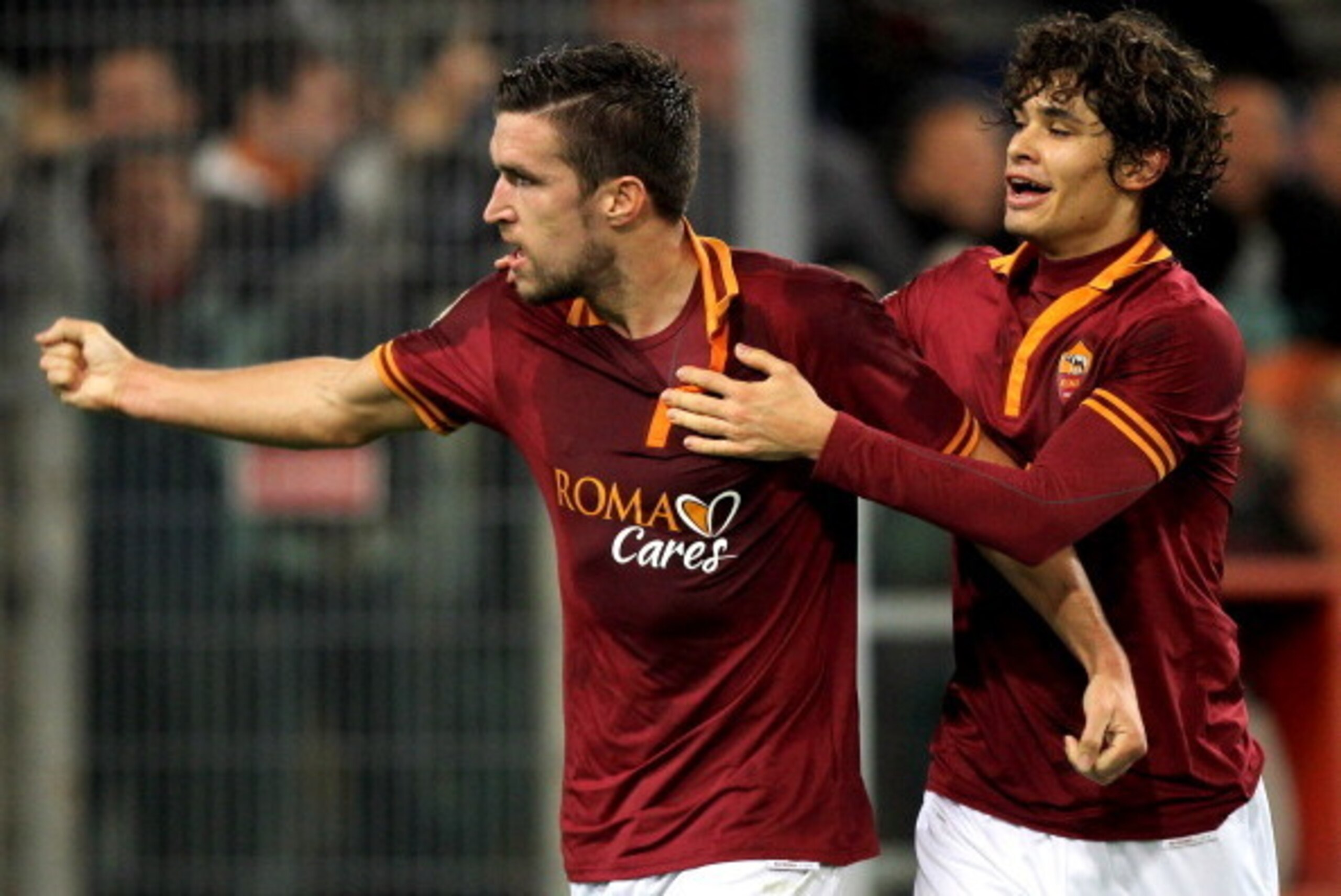 ROME, ITALY - JANUARY 18:  Kevin Strootman with his teammate Dodo #3 of AS Roma celebrates after scoring the second team's goal during the Serie A match between AS Roma and AS Livorno Calcio at Stadio Olimpico on January 18, 2014 in Rome, Italy.  (Photo b
