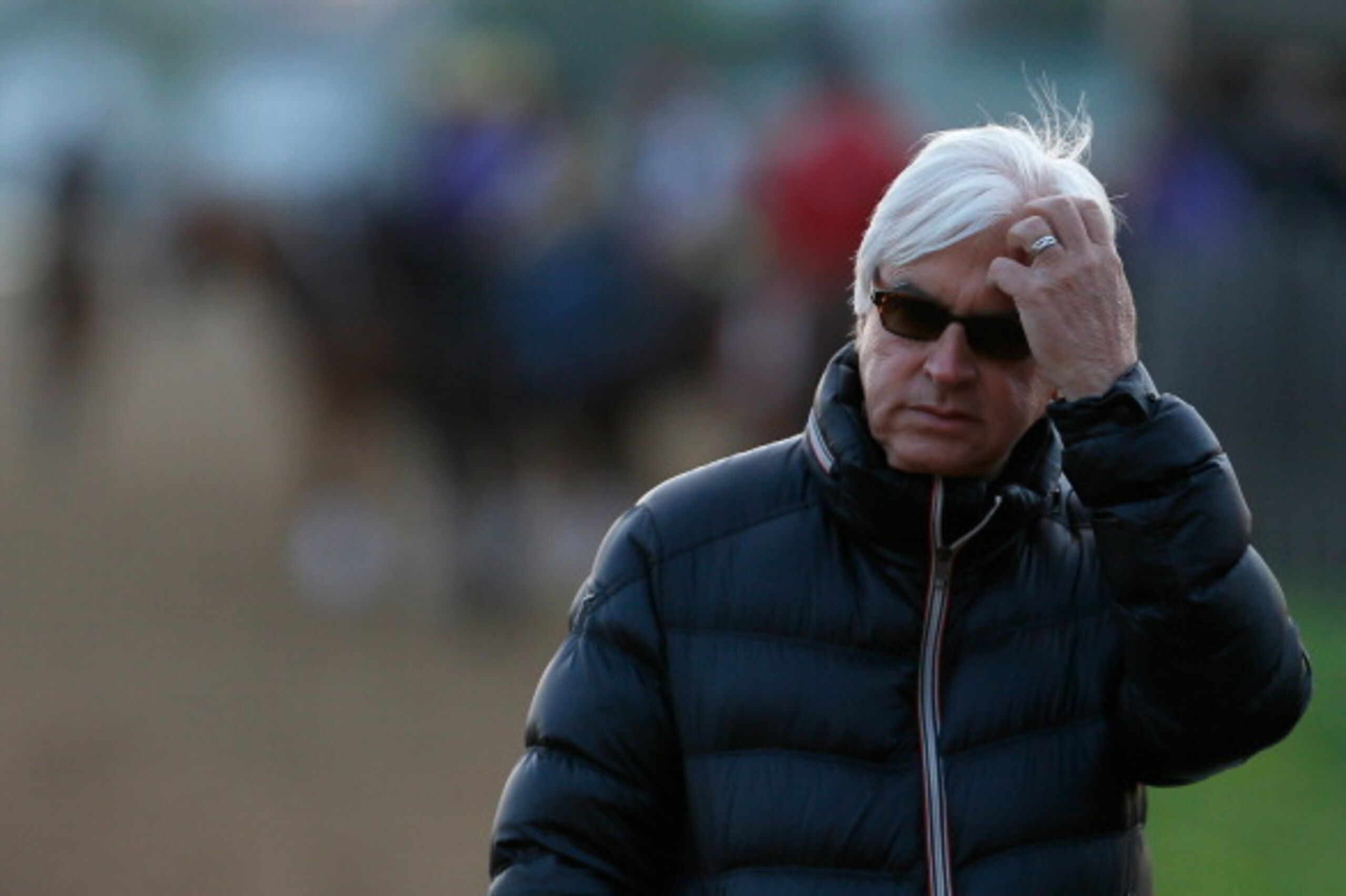 LOUISVILLE, KY - MAY 01:  Bob Baffert, trainer of Kentucky Derby contenders Hoppertunity and Chitu, watches track activity during early morning workouts at Churchill Downs on May 1, 2014 in Louisville, Kentucky.  (Photo by Kevin C. Cox/Getty Images)