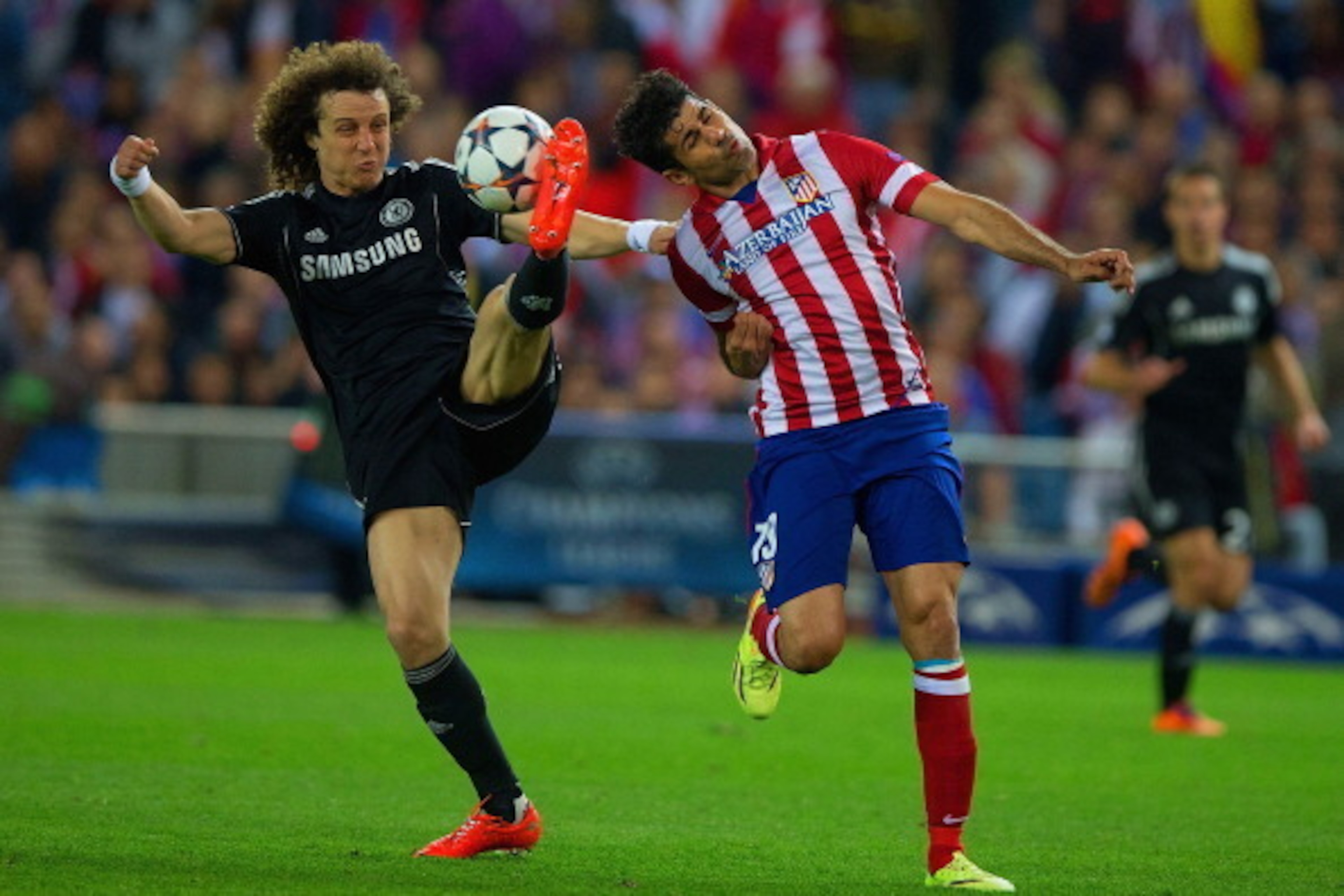 MADRID, SPAIN - APRIL 22: David Luiz of Chelsea and Diego Costa of Club Atletico de Madrid battle for the ball during the UEFA Champions League Semi Final first leg match between Club Atletico de Madrid and Chelsea at Vicente Calderon Stadium on April 22 MADRID, SPAIN - APRIL 22: David Luiz of Chelsea and Diego Costa of Club Atletico de Madrid battle for the ball during the UEFA Champions League Semi Final first leg match between Club Atletico de Madrid and Chelsea at Vicente Calderon Stadium on April 22