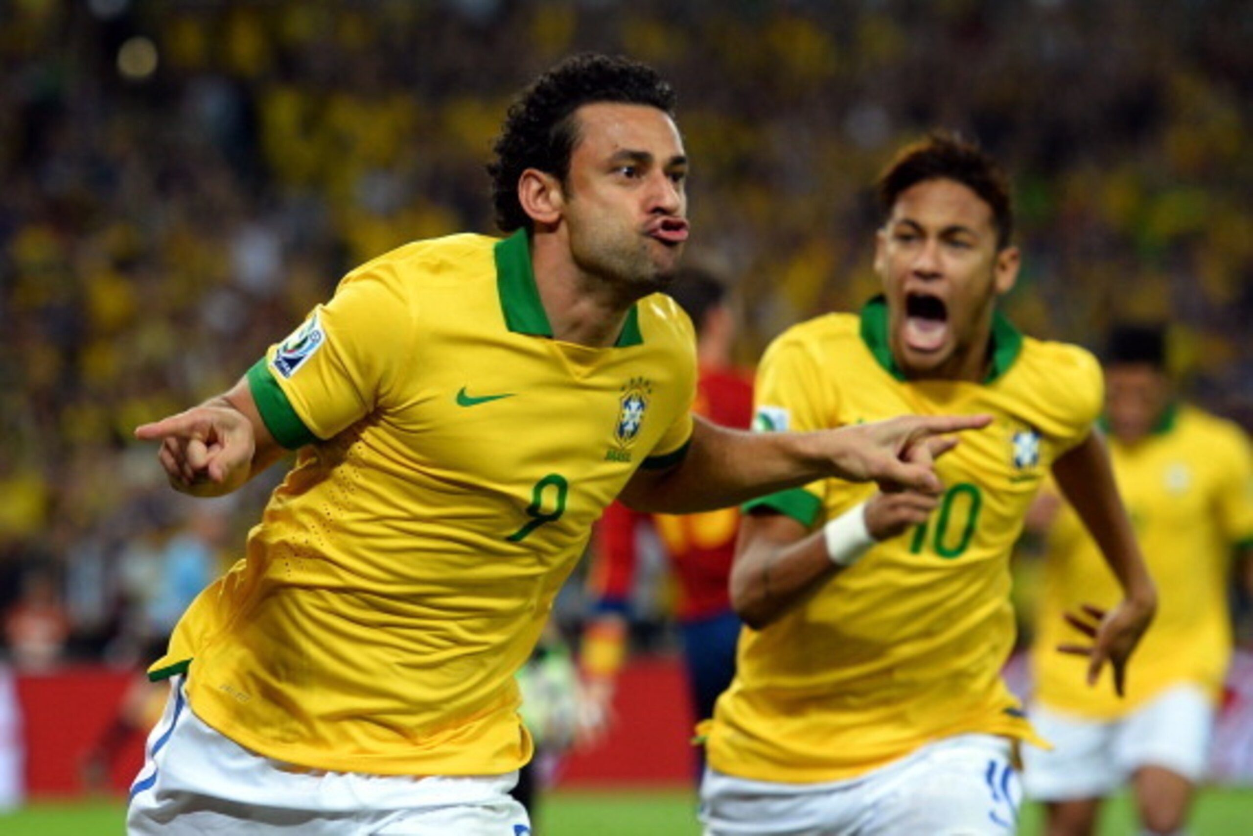 RIO DE JANEIRO, BRAZIL - JUNE 30:  Fred of Brazil celebrates scoring the opening goal with team-mate Neymar (R) during the FIFA Confederations Cup Brazil 2013 Final match between Brazil and Spain at Maracana on June 30, 2013 in Rio de Janeiro, Brazil.  (P