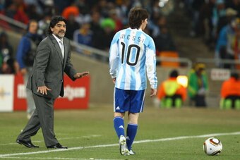 JOHANNESBURG, SOUTH AFRICA - JUNE 27:  Diego Maradona head coach of Argentina gestures to Lionel Messi of Argentina during to the 2010 FIFA World Cup South Africa Round of Sixteen match between Argentina and Mexico at Soccer City Stadium on June 27, 2010 