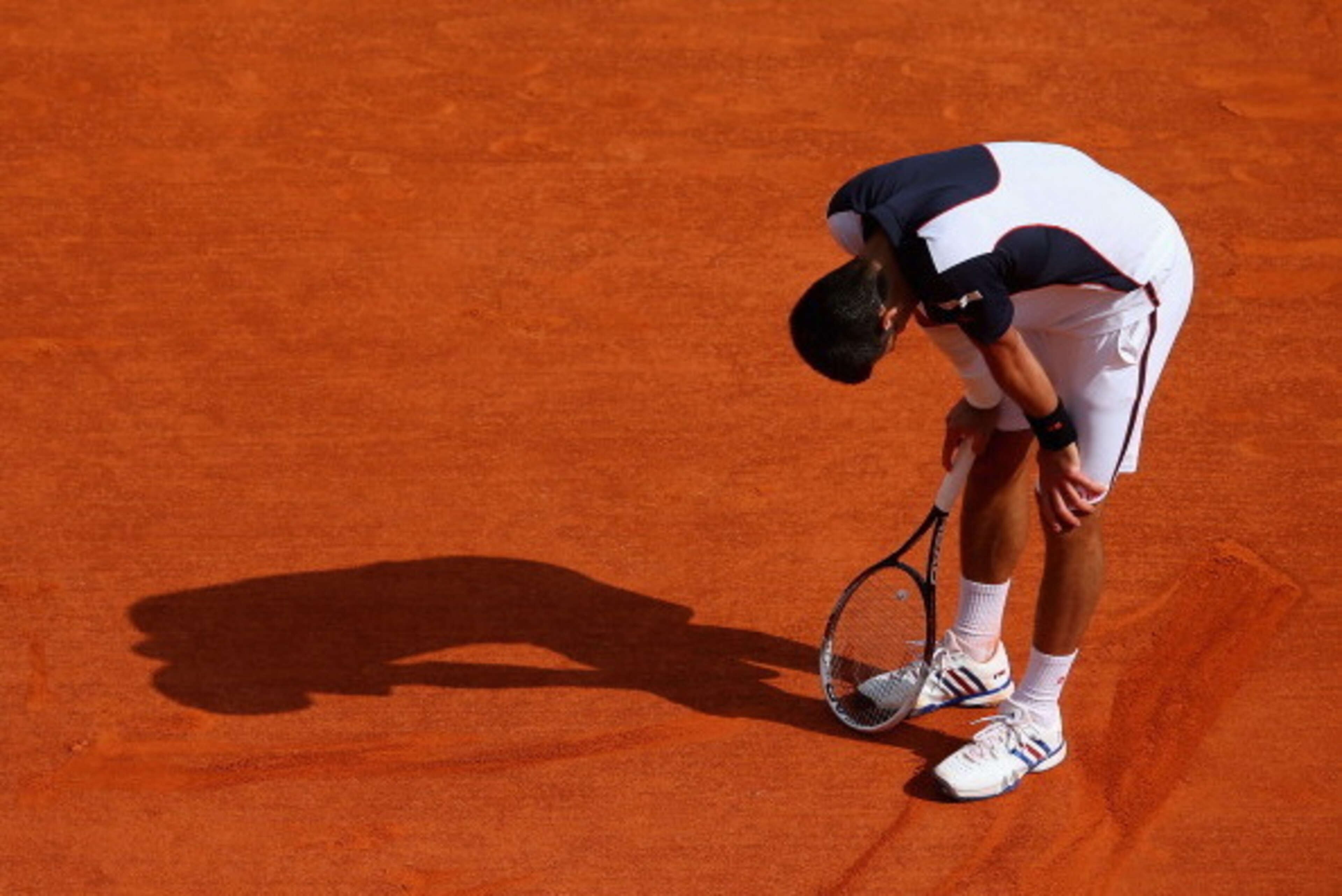 MONTE-CARLO, MONACO - APRIL 19:  Novak Djokovic of Serbia struggled in his match against Roger Federer of Switzerland in the semi finals during day seven of the ATP Monte Carlo Rolex Masters Tennis at Monte-Carlo Sporting Club on April 19, 2014 in Monte-C