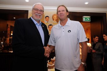 LONDON, ENGLAND - OCTOBER 2:   (L to R) Head Coach Phil Jackson of the Los Angeles Lakers with Head Coach Kurt Rambis of the Minnesota Timberwolves attend a team dinner for both the Los Angeles Lakers ad the Minnesota Timberwolves at the Palm Restaurant o