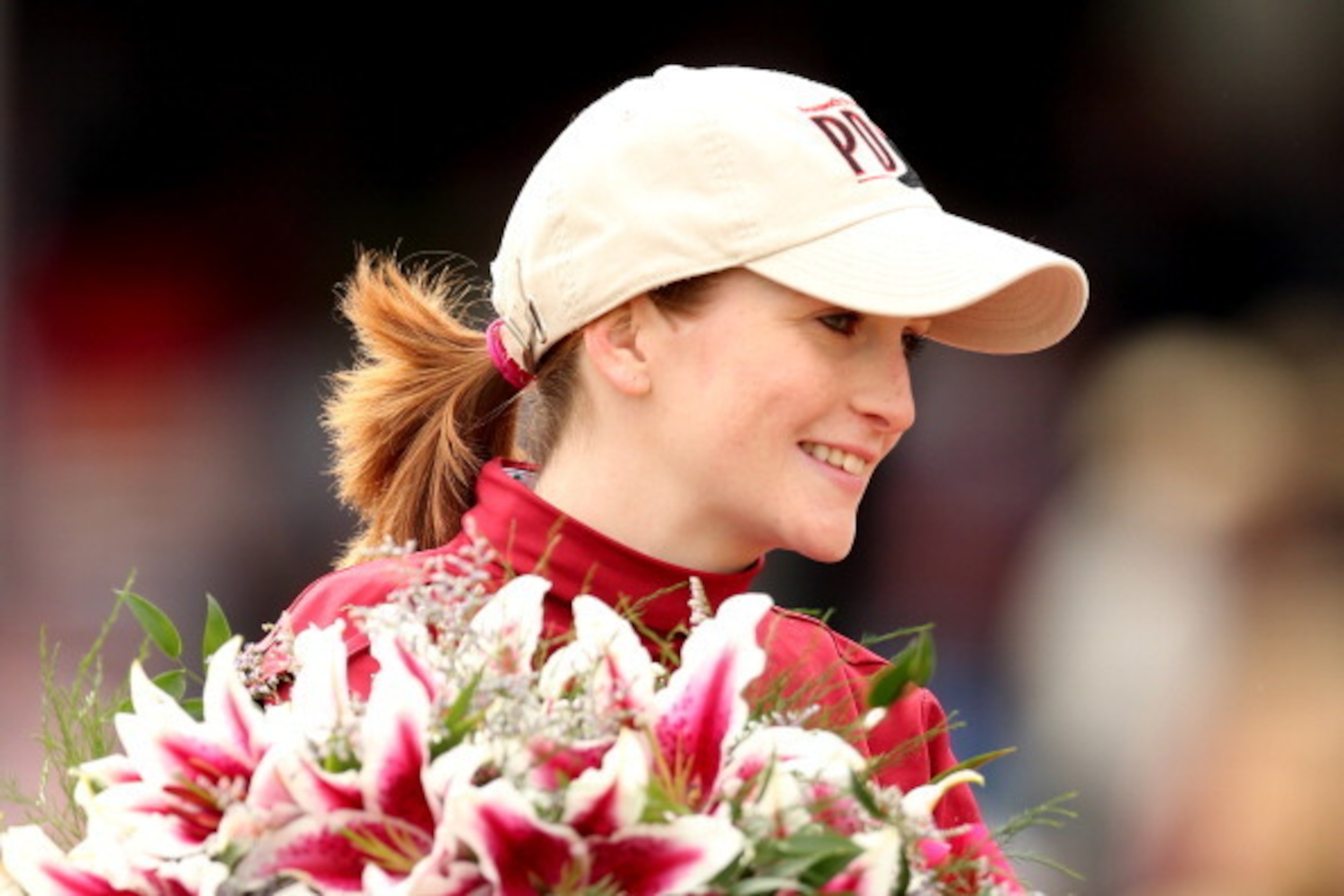 LOUISVILLE, KY - MAY 02:  Jockey Rosie Napravnik, celebrates atop of Untapable #13 after crossing the finish line to win the 140th running of the Kentucky Oaks at Churchill Downs on May 2, 2014 in Louisville, Kentucky.  (Photo by Matthew Stockman/Getty Im