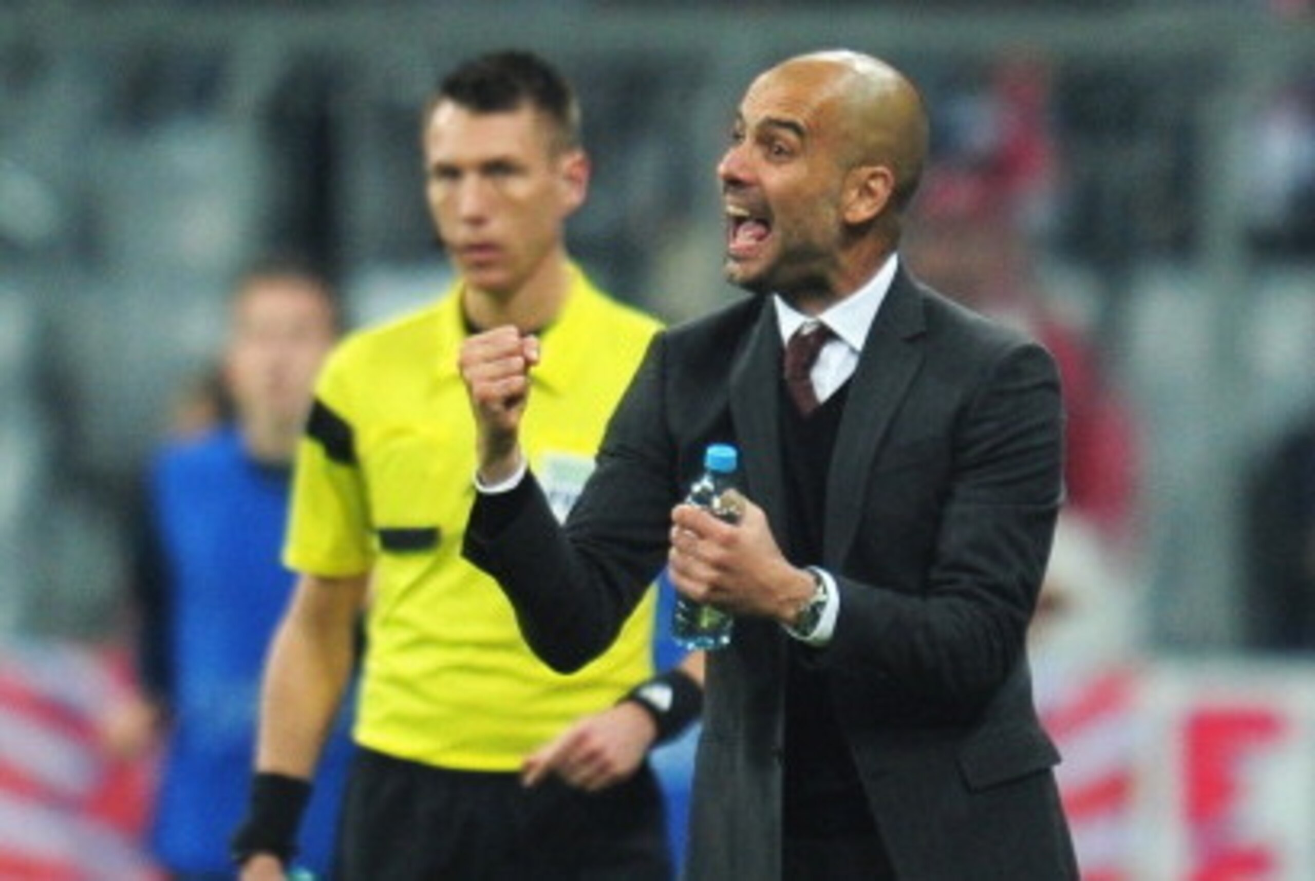 MUNICH, GERMANY - APRIL 09: Josep Guardiola, coach of Bayern Muenchen celebrates during the UEFA Champions League Quarter Final second leg match between FC Bayern Muenchen and Manchester United at Allianz Arena on April 9, 2014 in Munich, Germany.  (Photo