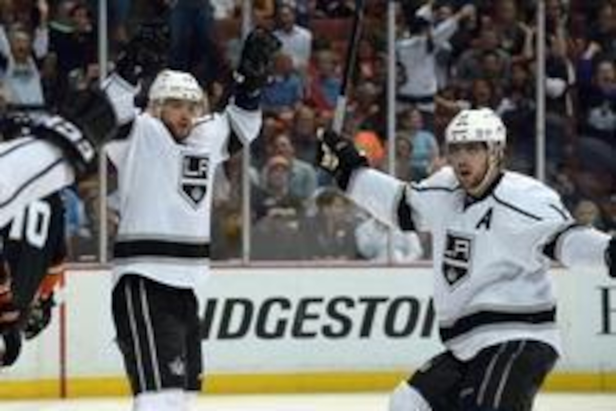 May 12, 2014; Anaheim, CA, USA; Los Angeles Kings right wing Marian Gaborik (12) and center Anze Kopitar (11) celebrate after a goal in the third period in game five of the second round of the 2014 Stanley Cup Playoffs against the Anaheim Ducks at Honda C