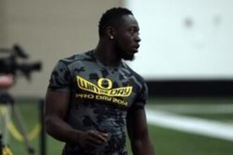 Mar 13, 2014; Eugene, OR, USA; Oregon Ducks running back De   Anthony Thomas works out in front of NFL scouts during the Oregon Pro Day at the Moshofsky Center. Mandatory Credit: Scott Olmos-USA TODAY Sports