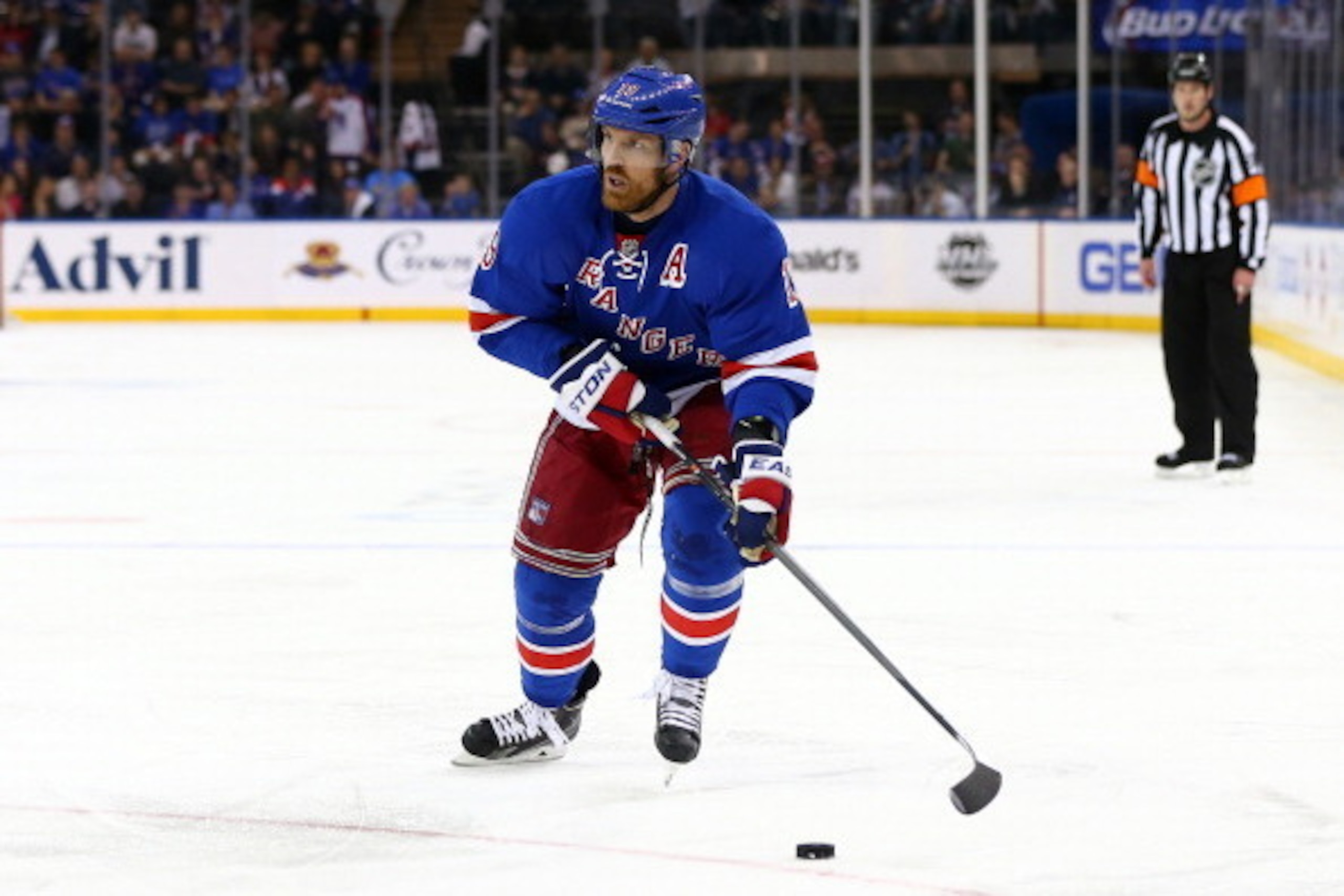 NEW YORK, NY - MAY 11:  Brad Richards #19 of the New York Rangers controls the puck against the Pittsburgh Penguins during Game Six of the Second Round of the 2014 NHL Stanley Cup Playoffs at Madison Square Garden on May 11, 2014 in New York City.  (Photo