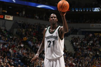 MINNEAPOLIS - MARCH 30:  Kevin Garnett #21 of the Minnesota Timberwolves stands on the court with the ball on hand during a game against the Miami Heat at the Target Center on March 30, 2007 in Minneapolis, Minnesota.  The Heat won 92-77.  NOTE TO USER: U