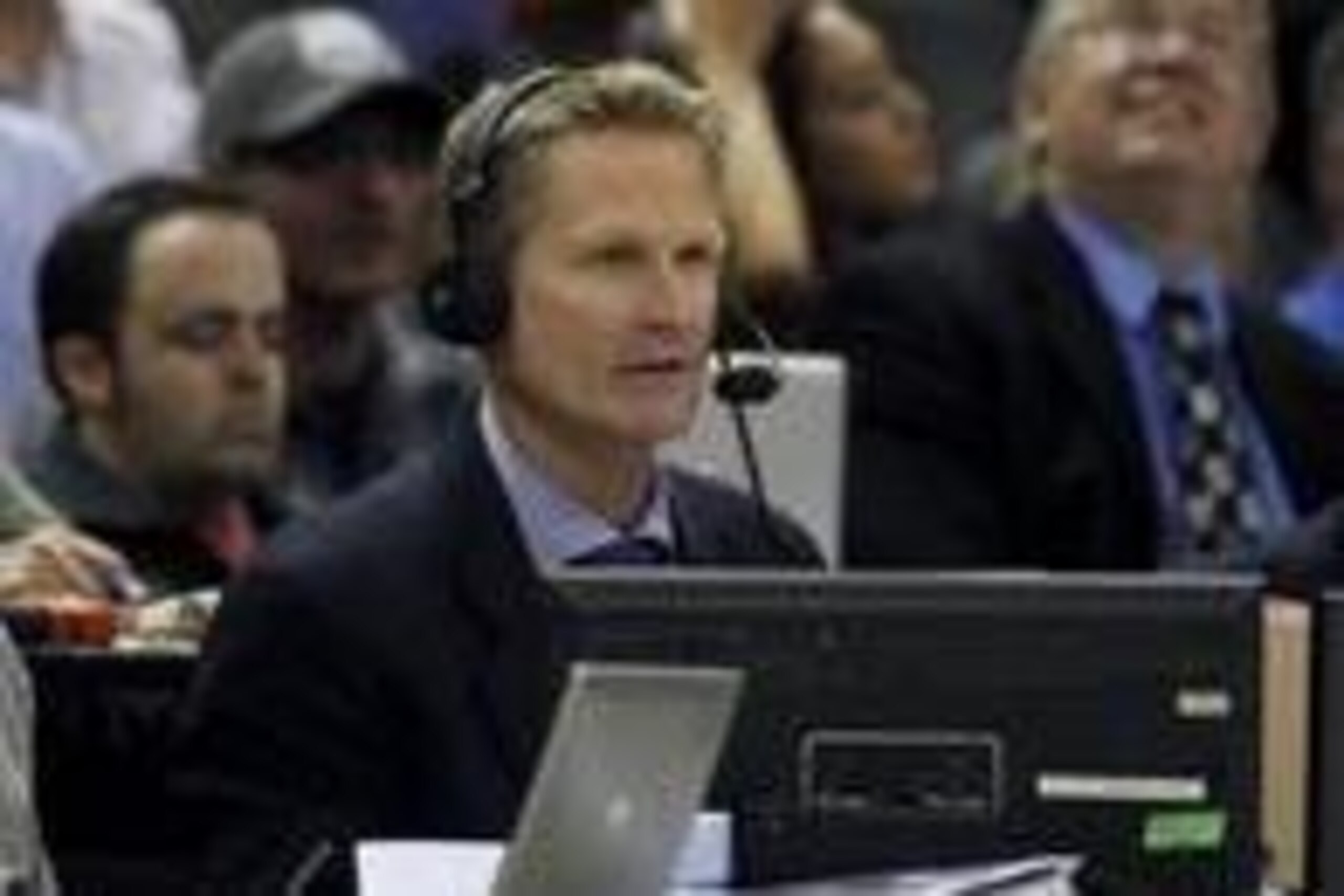 Mar 21, 2014; San Antonio, TX, USA; TV announcer Steve Kerr watches in the first half of a men's college basketball game between Providence Friars and North Carolina Tar Heels during the second round of the 2014 NCAA Tournament at AT&T Center. Mandatory C