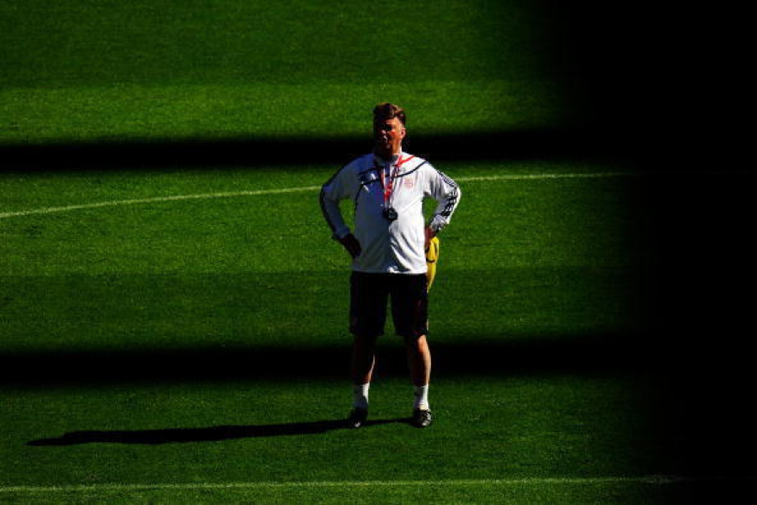 MADRID, SPAIN - MAY 21:  Coach Louis van Gaal gives instructions during the Bayern Munich training session prior to the UEFA Champions League Final match versus Inter Milan at the Estadio Santiago Bernabeu on May 21, 2010 in Madrid, Spain.  (Photo by Jami