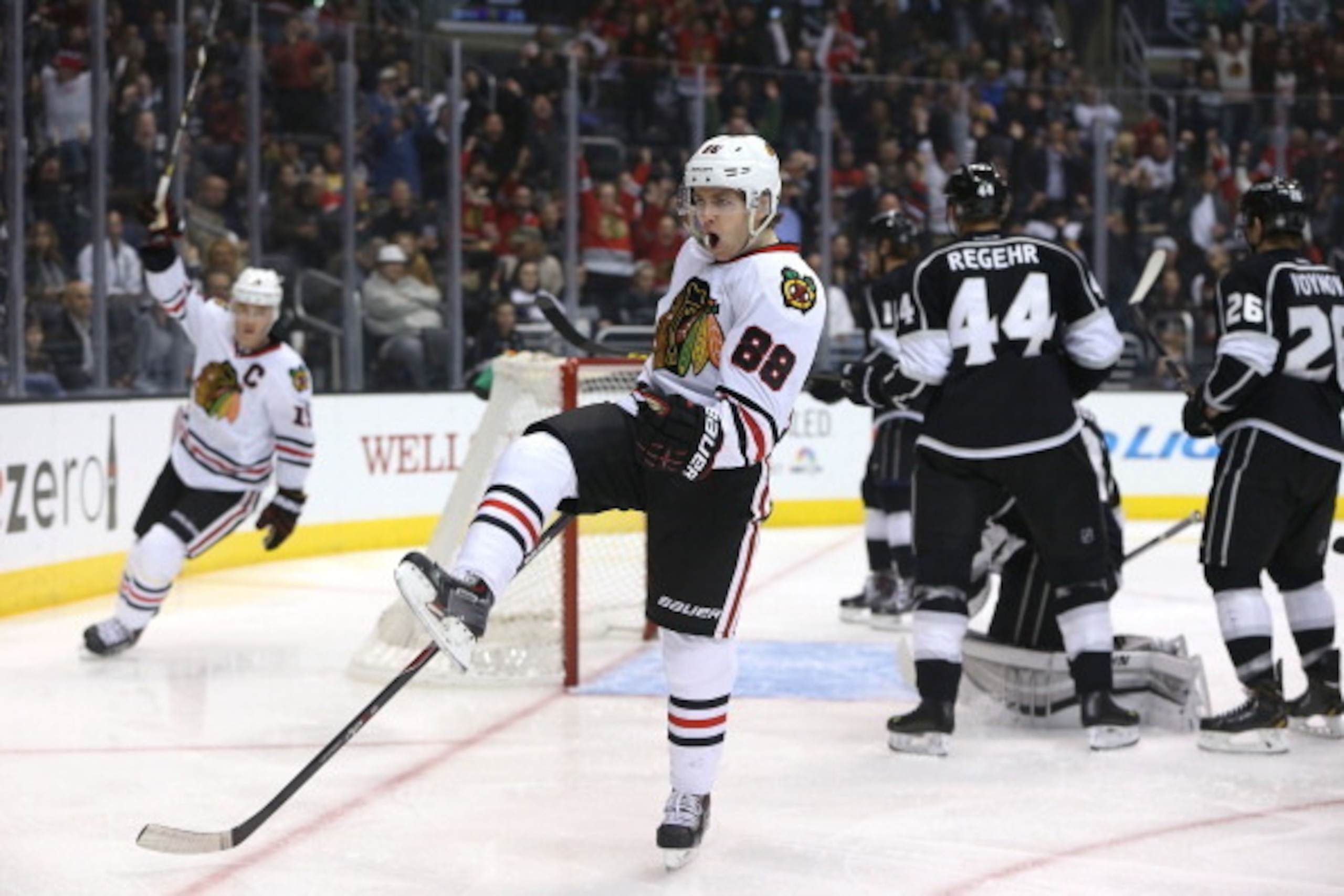 LOS ANGELES, CA - FEBRUARY 03:  Patrick Kane #88 of the Chicago Blackhawks celebrates his first-period goal against the Los Angeles Kings during the NHL game at Staples Center on February 3, 2014 in Los Angeles, California.  (Photo by Victor Decolongon/Ge