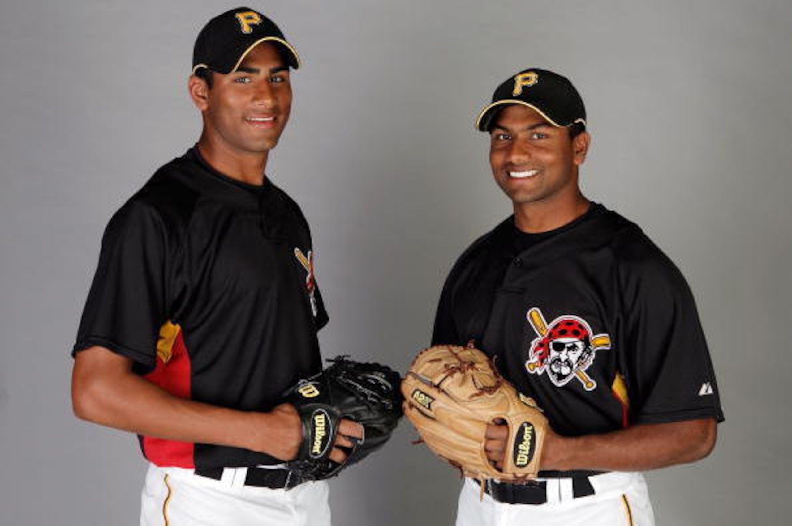 BRADENTON, FL - MARCH 27:  Rinku Singh, L, and Dinesh Patel of the Pittsburgh Pirates works out at the Pirates minor league training facility on March 27, 2009 in Bradenton, Florida.  (Photo by Doug Benc/Getty Images)