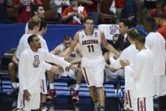 Mar 29, 2014; Anaheim, CA, USA; Arizona Wildcats forward Aaron Gordon (11) high-fives teammates during player introductions before the finals of the west regional of the 2014 NCAA Mens Basketball Championship tournament against the Wisconsin Badgers at Ho