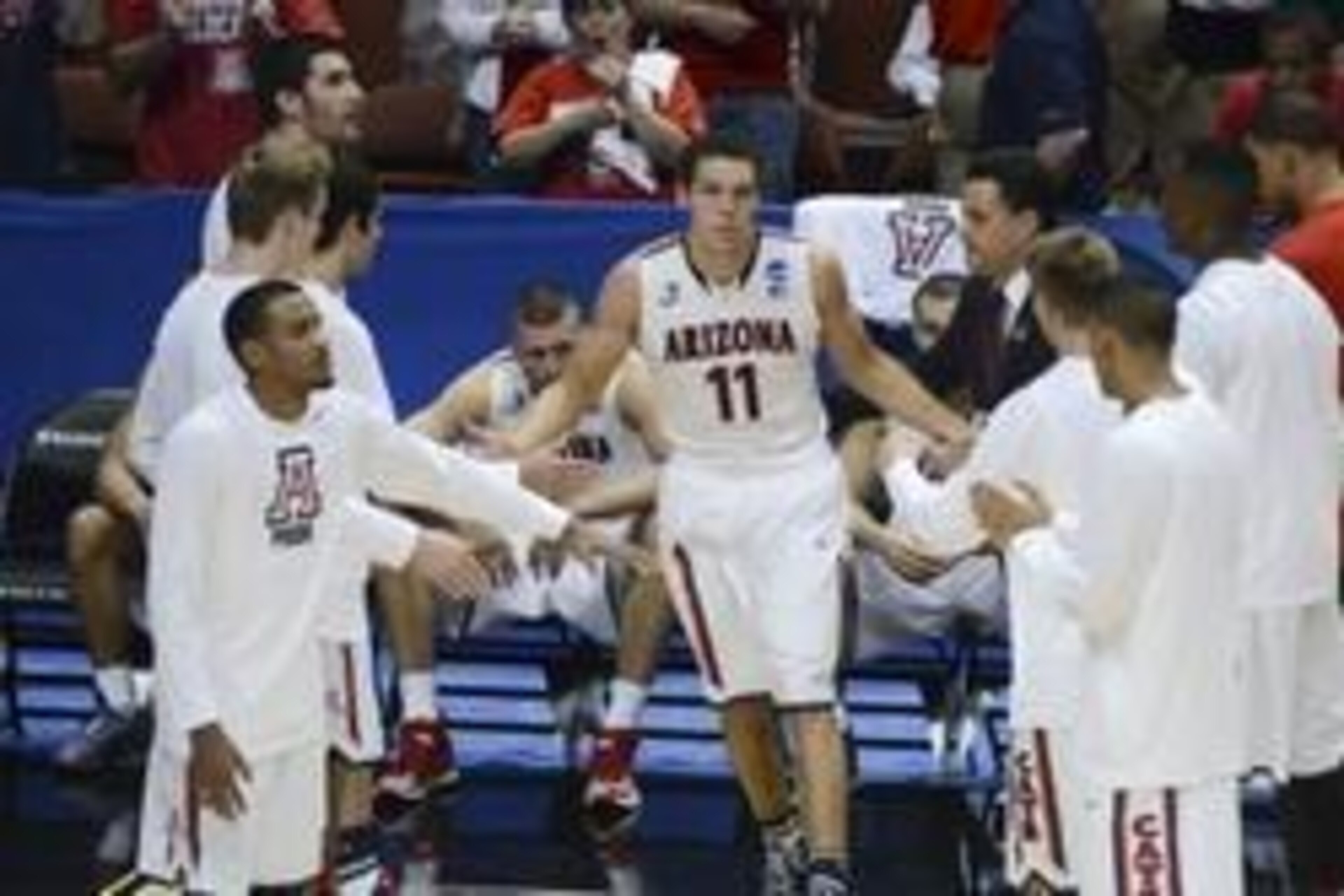 Mar 29, 2014; Anaheim, CA, USA; Arizona Wildcats forward Aaron Gordon (11) high-fives teammates during player introductions before the finals of the west regional of the 2014 NCAA Mens Basketball Championship tournament against the Wisconsin Badgers at Ho Mar 29, 2014; Anaheim, CA, USA; Arizona Wildcats forward Aaron Gordon (11) high-fives teammates during player introductions before the finals of the west regional of the 2014 NCAA Mens Basketball Championship tournament against the Wisconsin Badgers at Ho