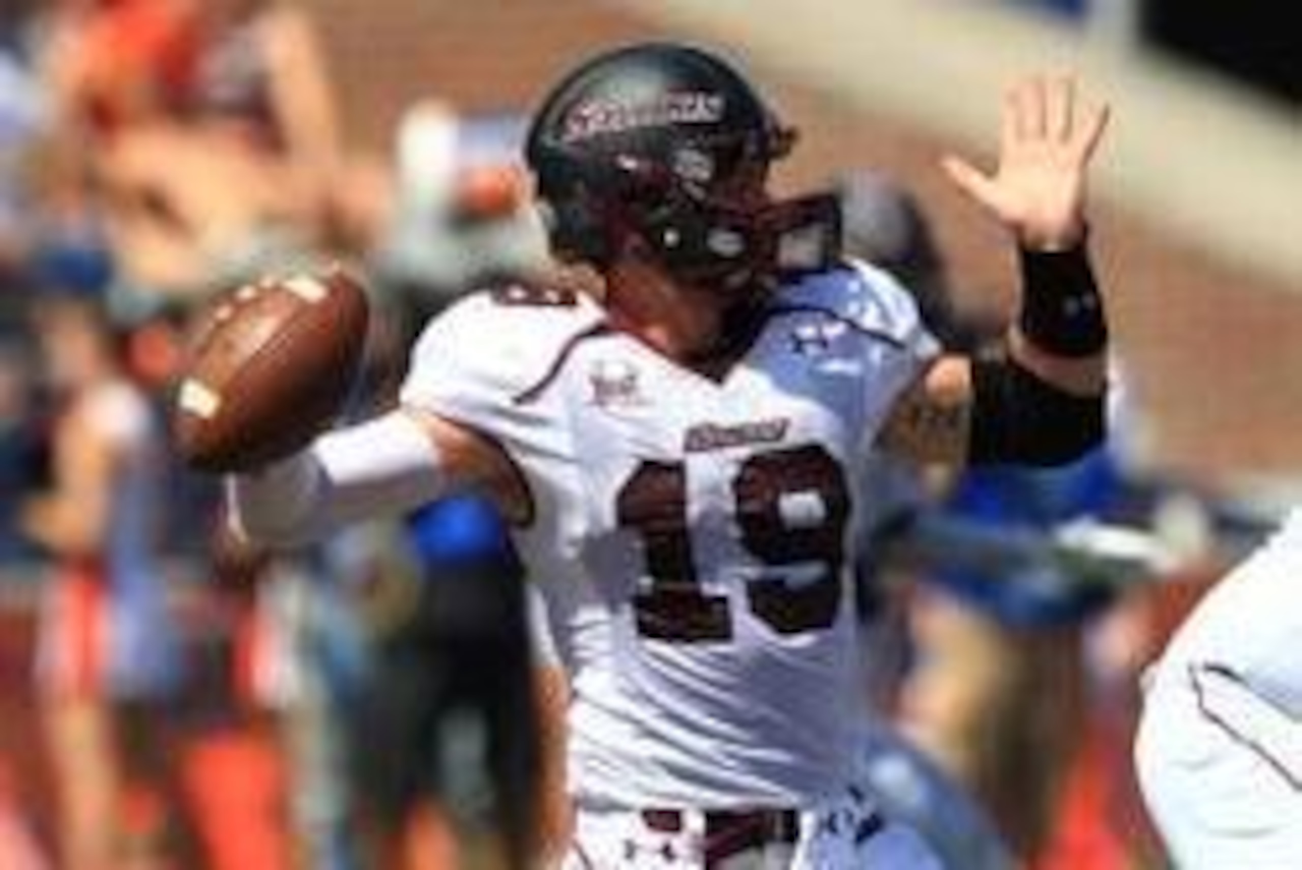Aug 31, 2013; Champaign, IL, USA; Southern Illinois Salukis quarterback Kory Faulkner (19) drops back to pass against the Illinois Fighting Illini] at Memorial Stadium. Illinois won 42-34. Mandatory Credit: Pat Lovell-USA TODAY Sports