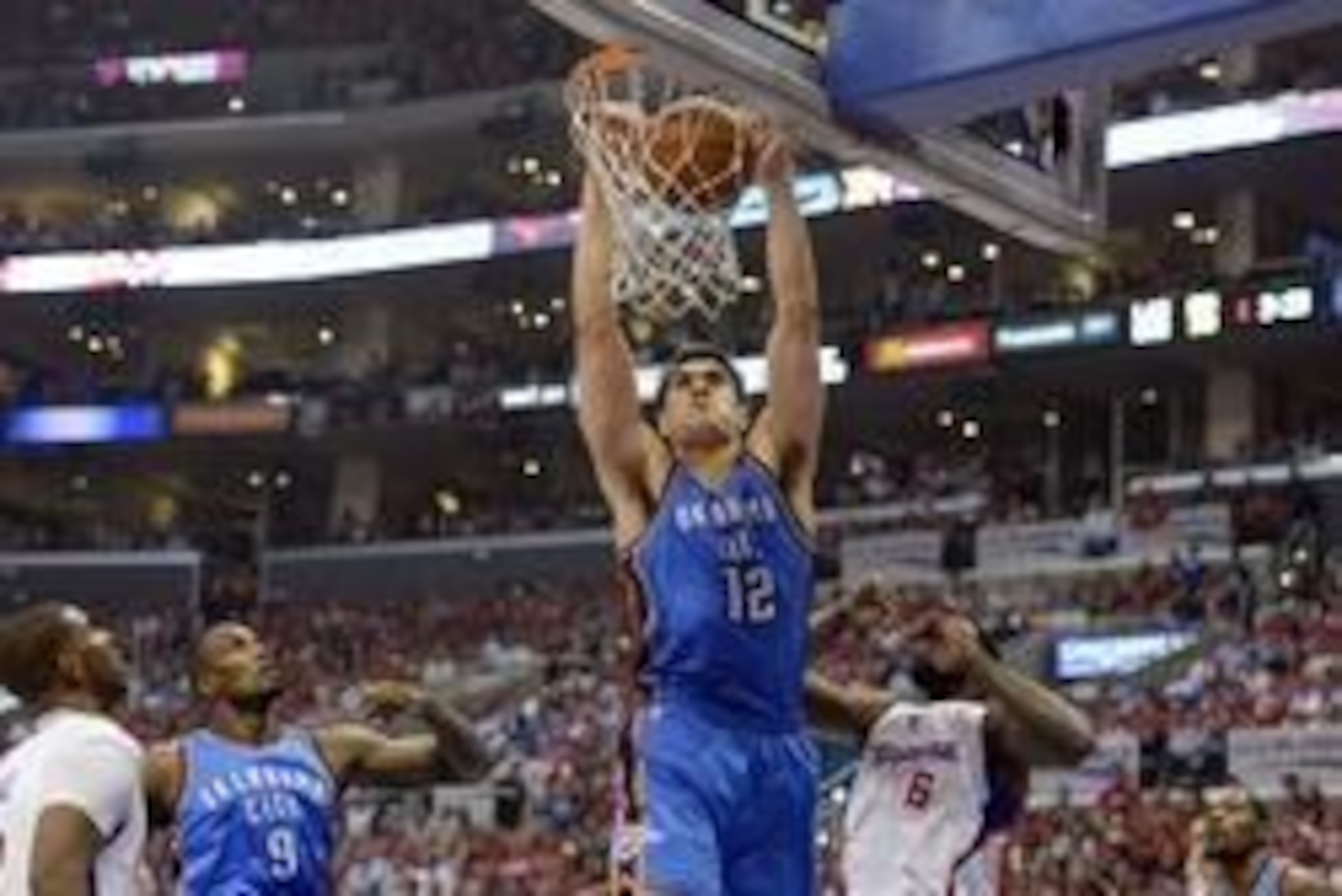 May 15, 2014; Los Angeles, CA, USA; Oklahoma City Thunder center Steven Adams (12) dunks against the Los Angeles Clippers during the first quarter in game six of the second round of the 2014 NBA Playoffs at Staples Center. Mandatory Credit: Richard Mackso May 15, 2014; Los Angeles, CA, USA; Oklahoma City Thunder center Steven Adams (12) dunks against the Los Angeles Clippers during the first quarter in game six of the second round of the 2014 NBA Playoffs at Staples Center. Mandatory Credit: Richard Mackso