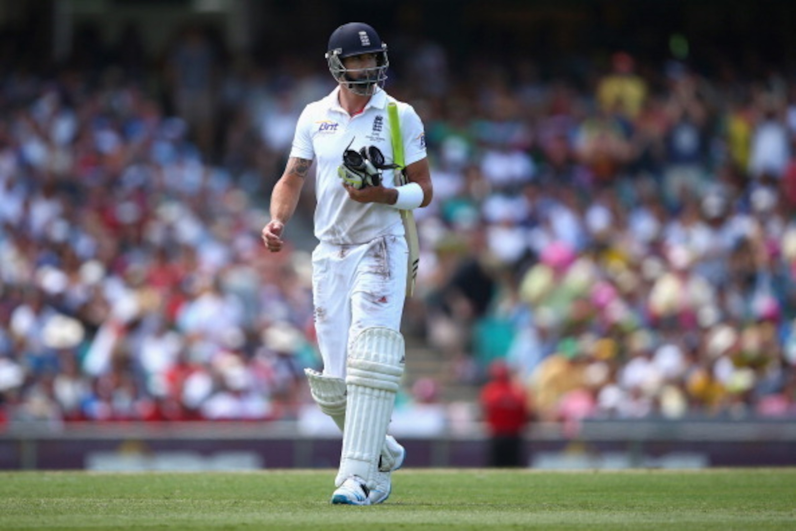 SYDNEY, AUSTRALIA - JANUARY 04:  Kevin Pietersen of England walks off the field after being dismissed by Ryan Harris of Australia during day two of the Fifth Ashes Test match between Australia and England at Sydney Cricket Ground on January 4, 2014 in Syd