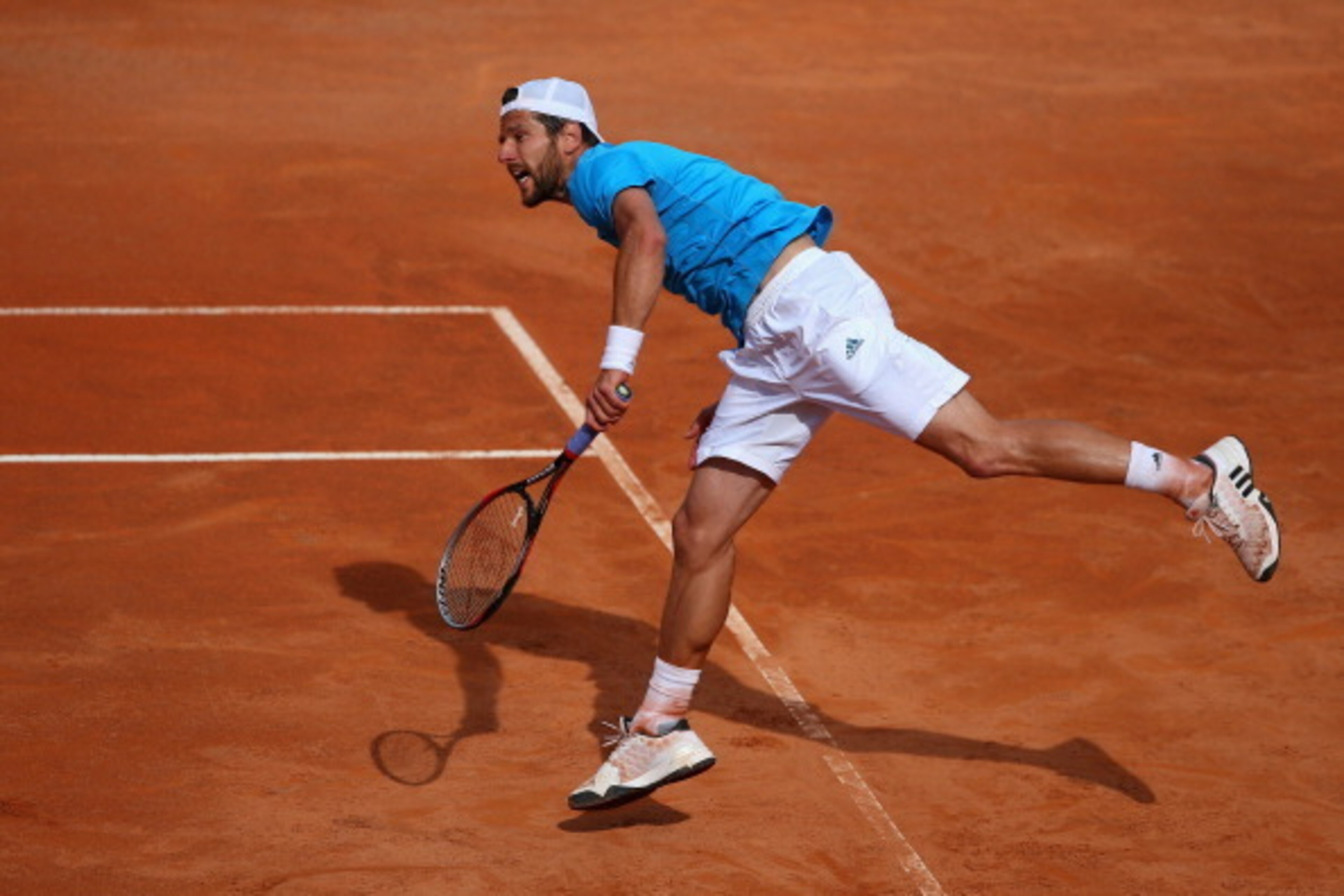 ROME, ITALY - MAY 15:  Jurgen Melzer of Austria serves to Andy Murray of Great Britain during day five of the Internazionali BNL d'Italia tennis 2014 on May 15, 2014 in Rome, Italy.  (Photo by Julian Finney/Getty Images)