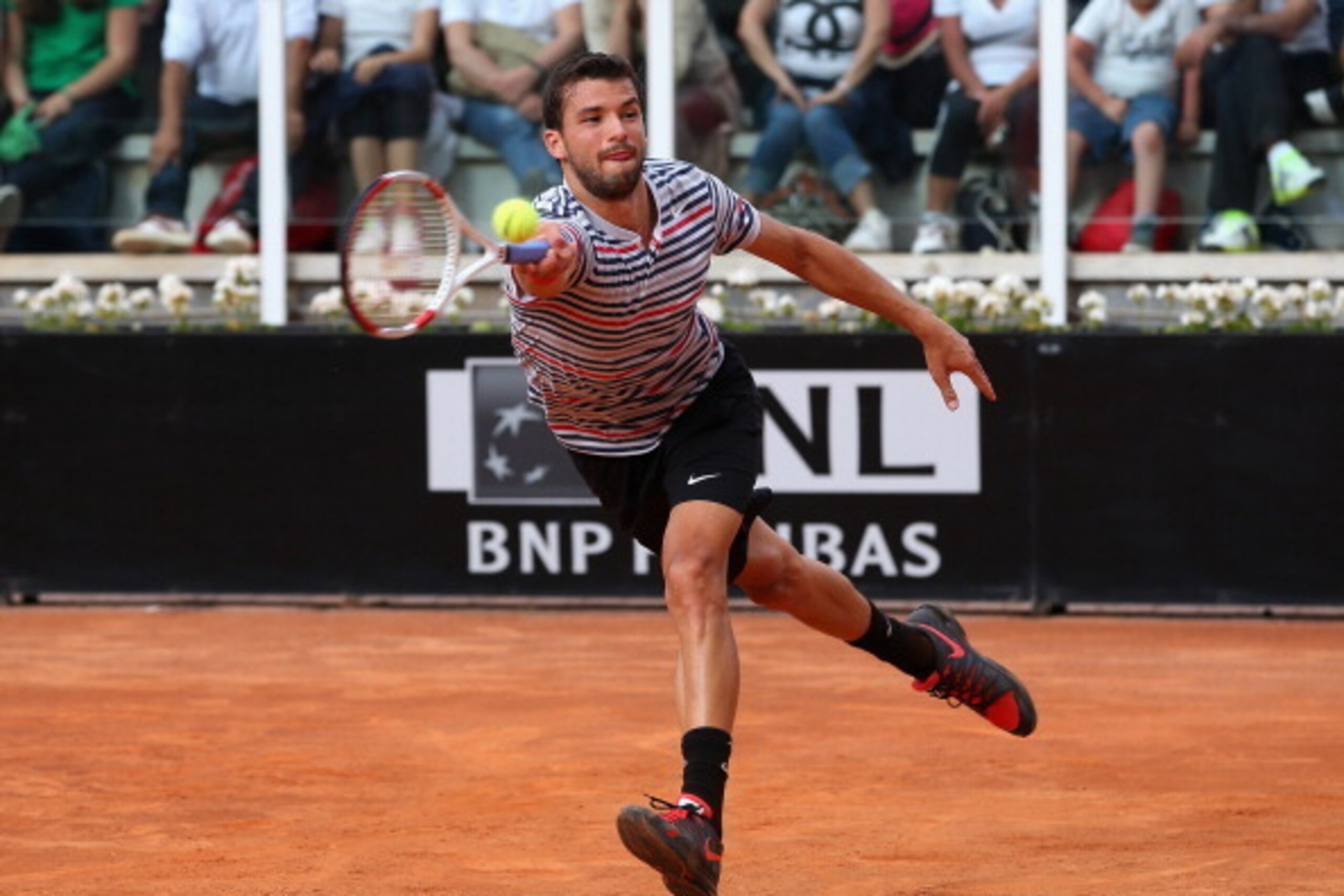 ROME, ITALY - MAY 15:  Grigor Dimitrov of Bulgaria in action in his match against Tomas Berdych of Czech Republic during day five of the Internazionali BNL d'Italia tennis 2014 on May 15, 2014 in Rome, Italy.  (Photo by Julian Finney/Getty Images)