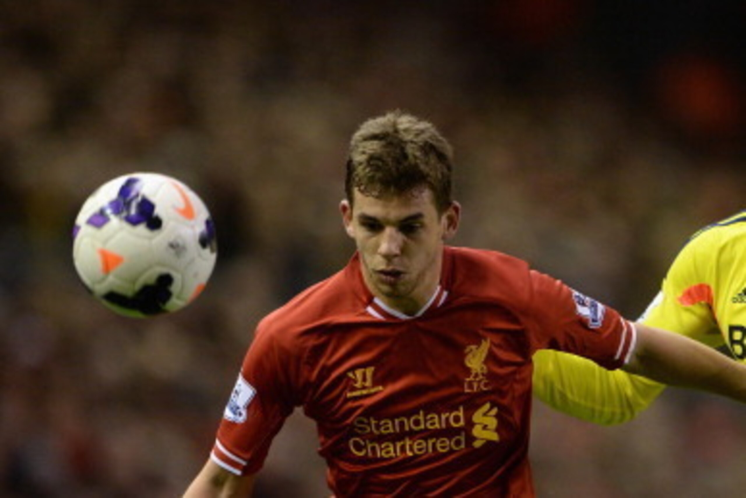 LIVERPOOL, ENGLAND - MARCH 26:  Jon Flanagan of Liverpool competes with Jozy Altidore of Sunderland
 during the Barclays Premier League match between Liverpool and Sunderland at Anfield on March 26, 2014 in Liverpool, England.  (Photo by Michael Regan/Get