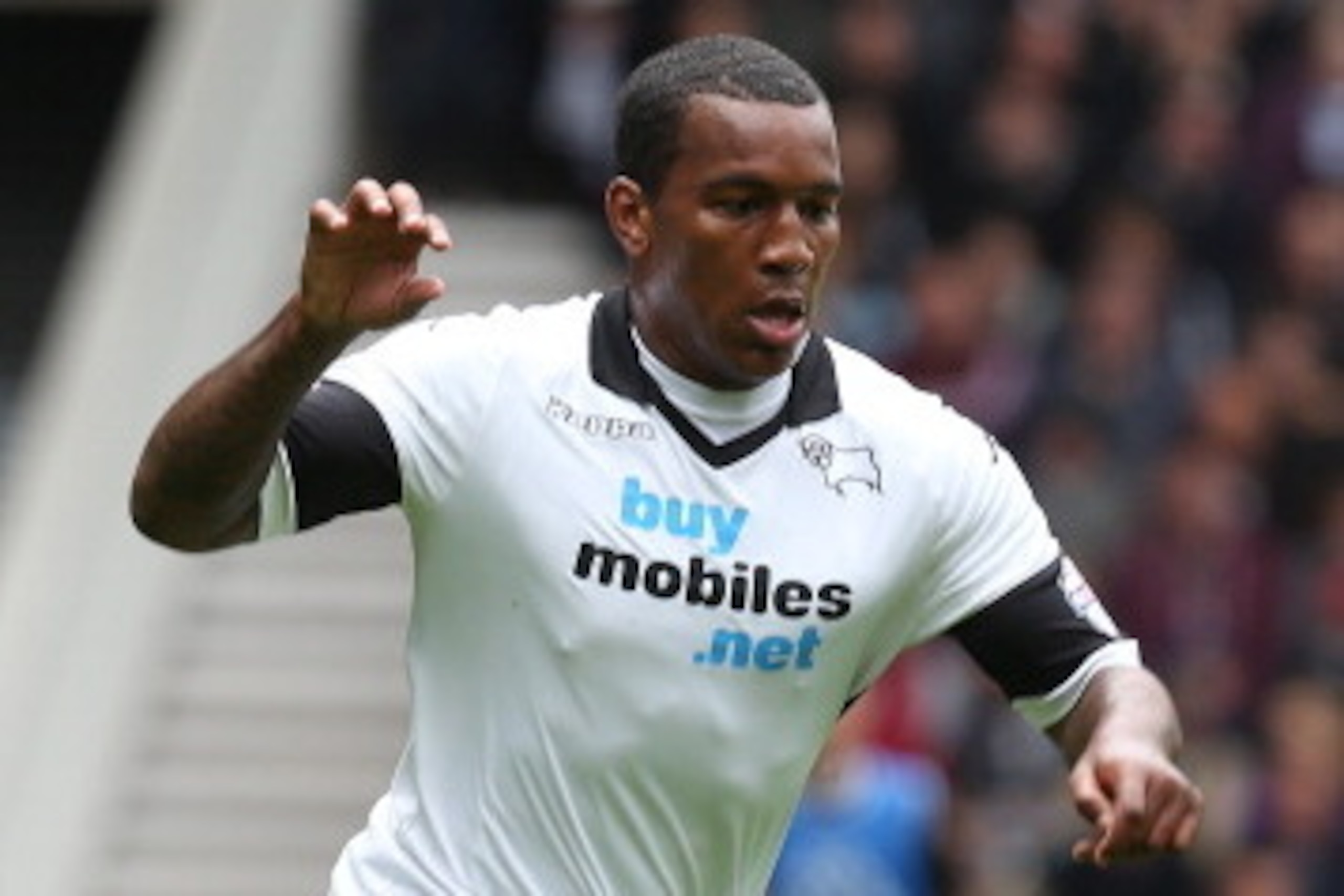 DERBY, ENGLAND - MAY 11:  Andre Wisdom of Derby County in action during the Sky Bet Championship Semi Final Second Leg between Derby County and Brighton & Hove Albion at iPro Stadium on May 11, 2014 in Derby, England.  (Photo by Pete Norton/Getty Images)