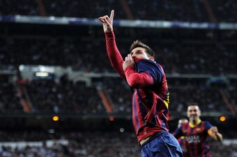 MADRID, SPAIN - MARCH 23:  Lionel Messi of Barcelona celebrates scoring his team's fourth goal during the La Liga match between Real Madrid CF and FC Barcelona at the Bernabeu on March 23, 2014 in Madrid, Spain.  (Photo by Denis Doyle/Getty Images)