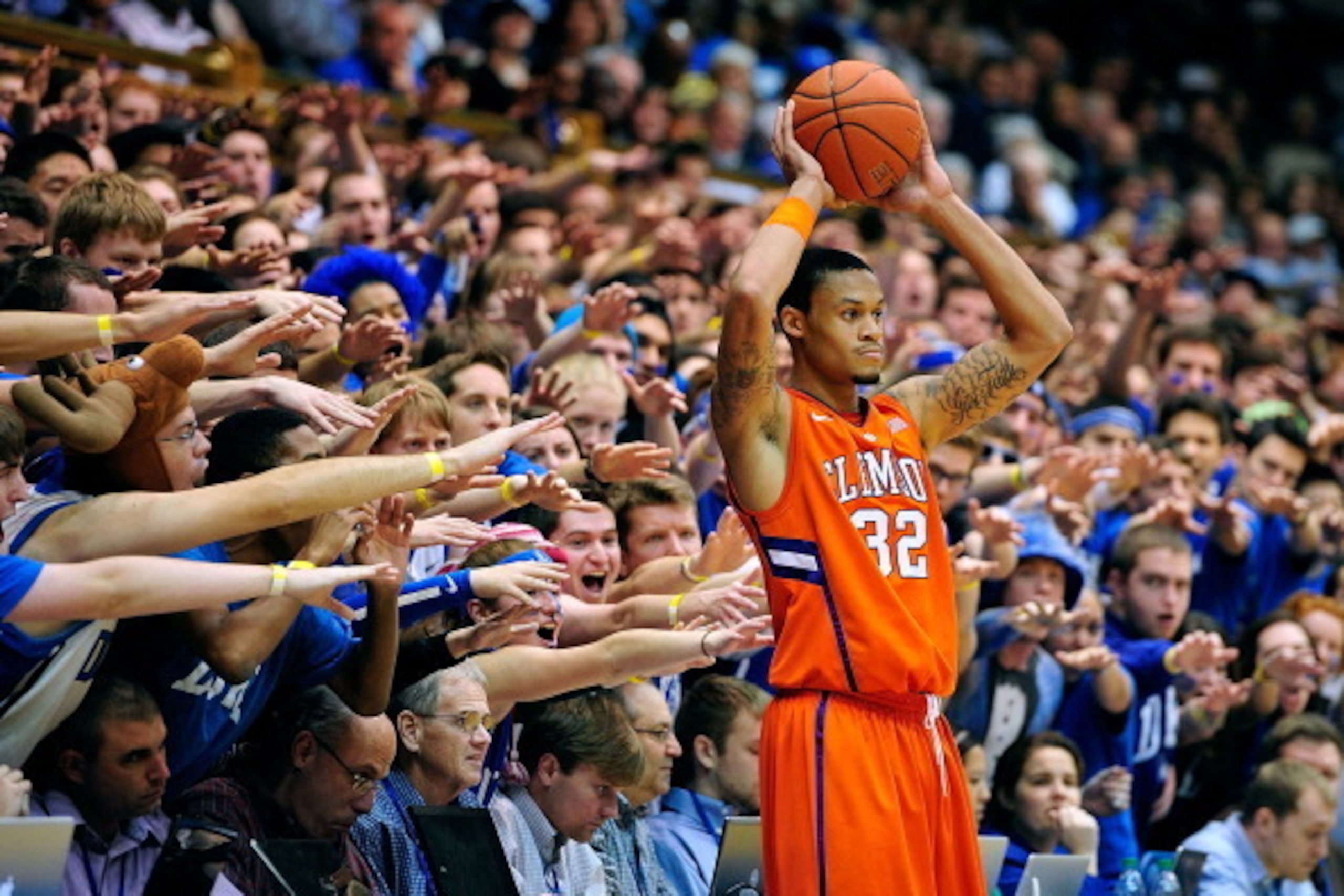 DURHAM, NC - JANUARY 08:  The Cameron Crazies taunt K.J. McDaniels #32 of the Clemson Tigers as he prepares to inbound the ball against the Duke Blue Devils during play at Cameron Indoor Stadium on January 8, 2013 in Durham, North Carolina. Duke won 68-40