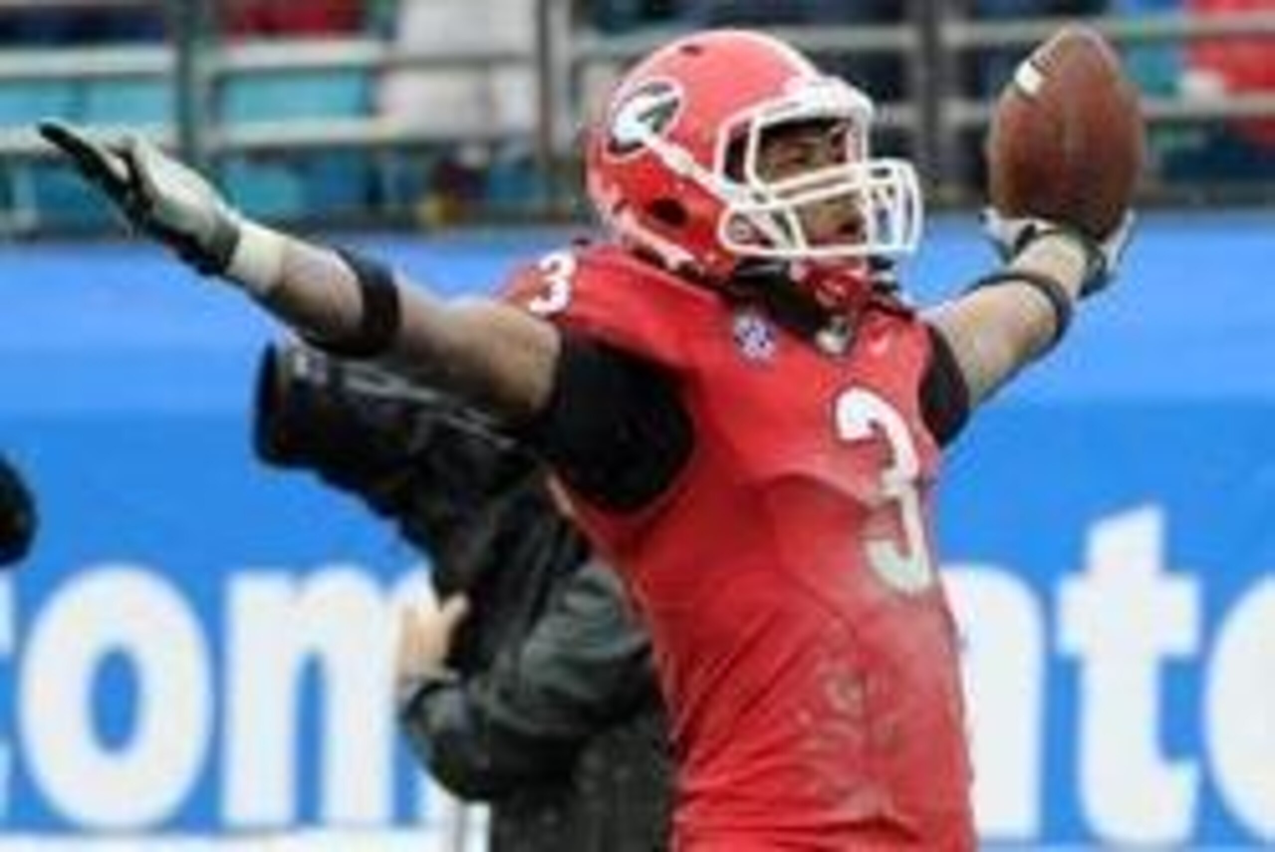 Jan 1, 2014; Jacksonville, FL, USA; Georgia Bulldogs running back Todd Gurley (3) celebrates after a touchdown during the second half of the game against the Nebraska Cornhuskers at EverBank Field . Mandatory Credit: Melina Vastola-USA TODAY Sports