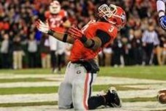 Nov 23, 2013; Athens, GA, USA; Georgia Bulldogs running back Todd Gurley (3) celebrates a touchdown in the first half against the Kentucky Wildcats at Sanford Stadium. Mandatory Credit: Daniel Shirey-USA TODAY Sports