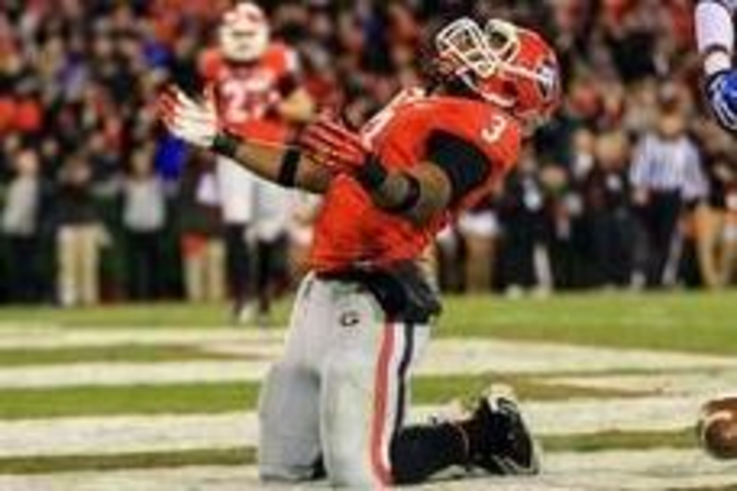 Nov 23, 2013; Athens, GA, USA; Georgia Bulldogs running back Todd Gurley (3) celebrates a touchdown in the first half against the Kentucky Wildcats at Sanford Stadium. Mandatory Credit: Daniel Shirey-USA TODAY Sports