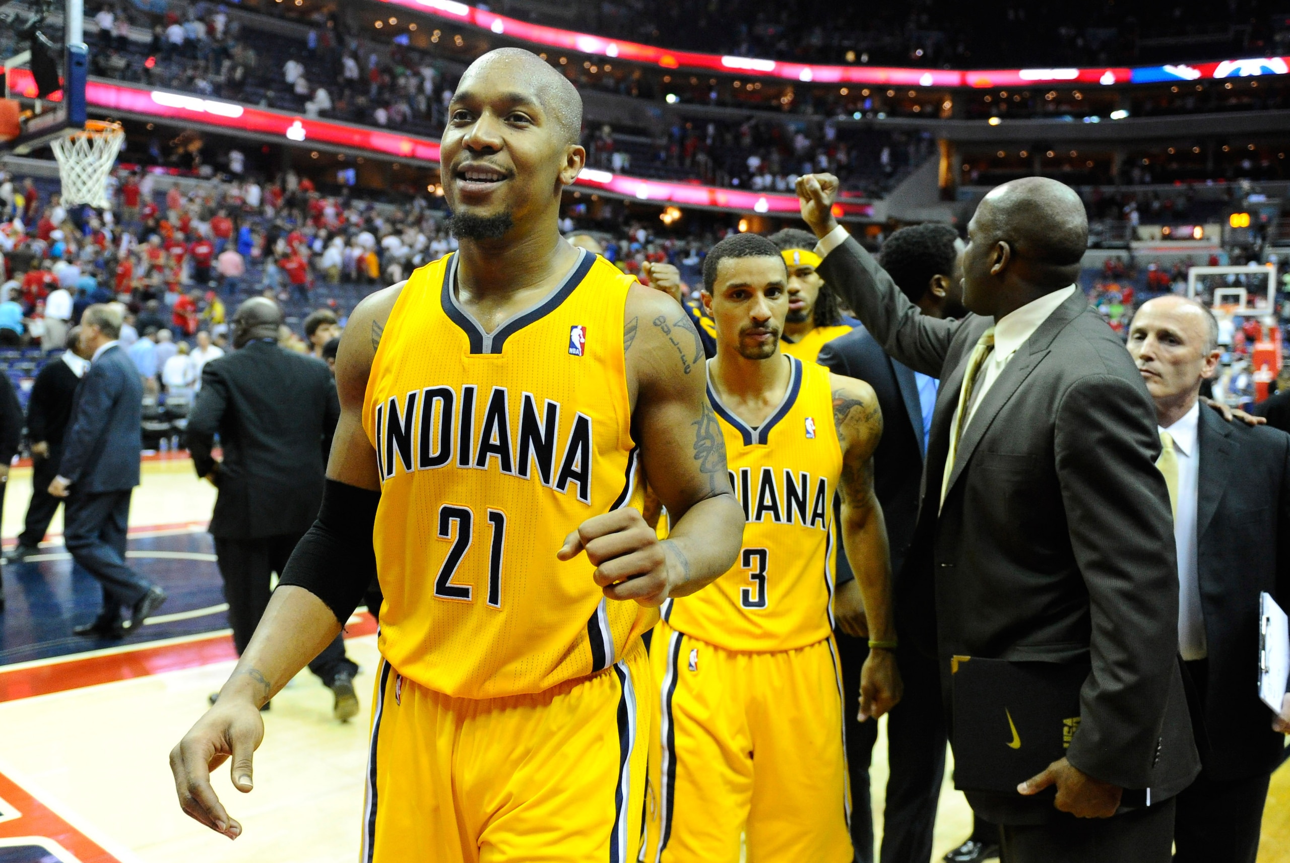 May 11, 2014; Washington, DC, USA; Indiana Pacers power forward David West (21) and Indiana Pacers point guard George Hill (3) react after the game against the Washington Wizards in game four of the second round of the 2014 NBA Playoffs at Verizon Center.