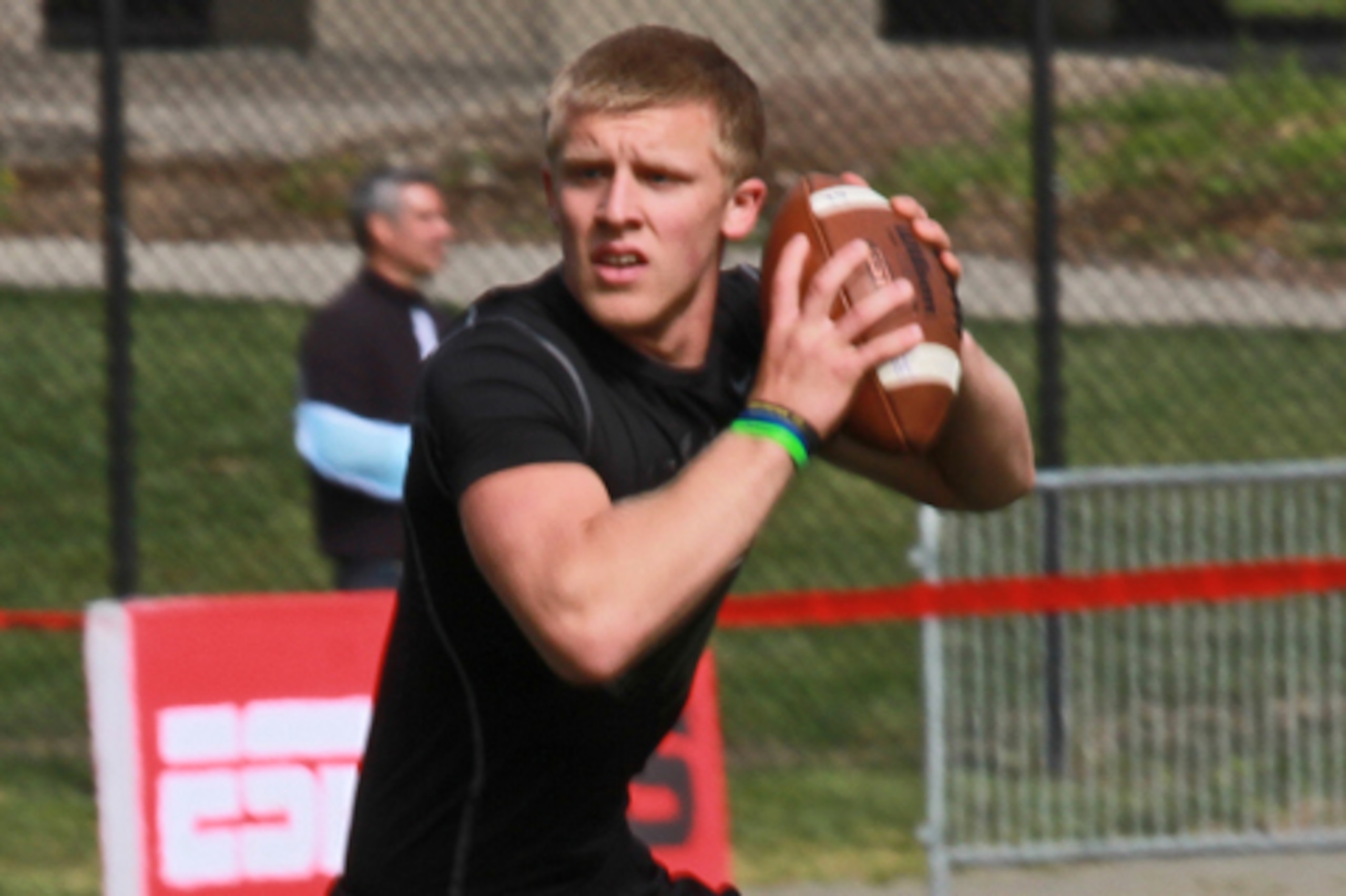 Madden helps protect 2015 QB prospect Cinjun Erskine, who also holds a Miami offer.
