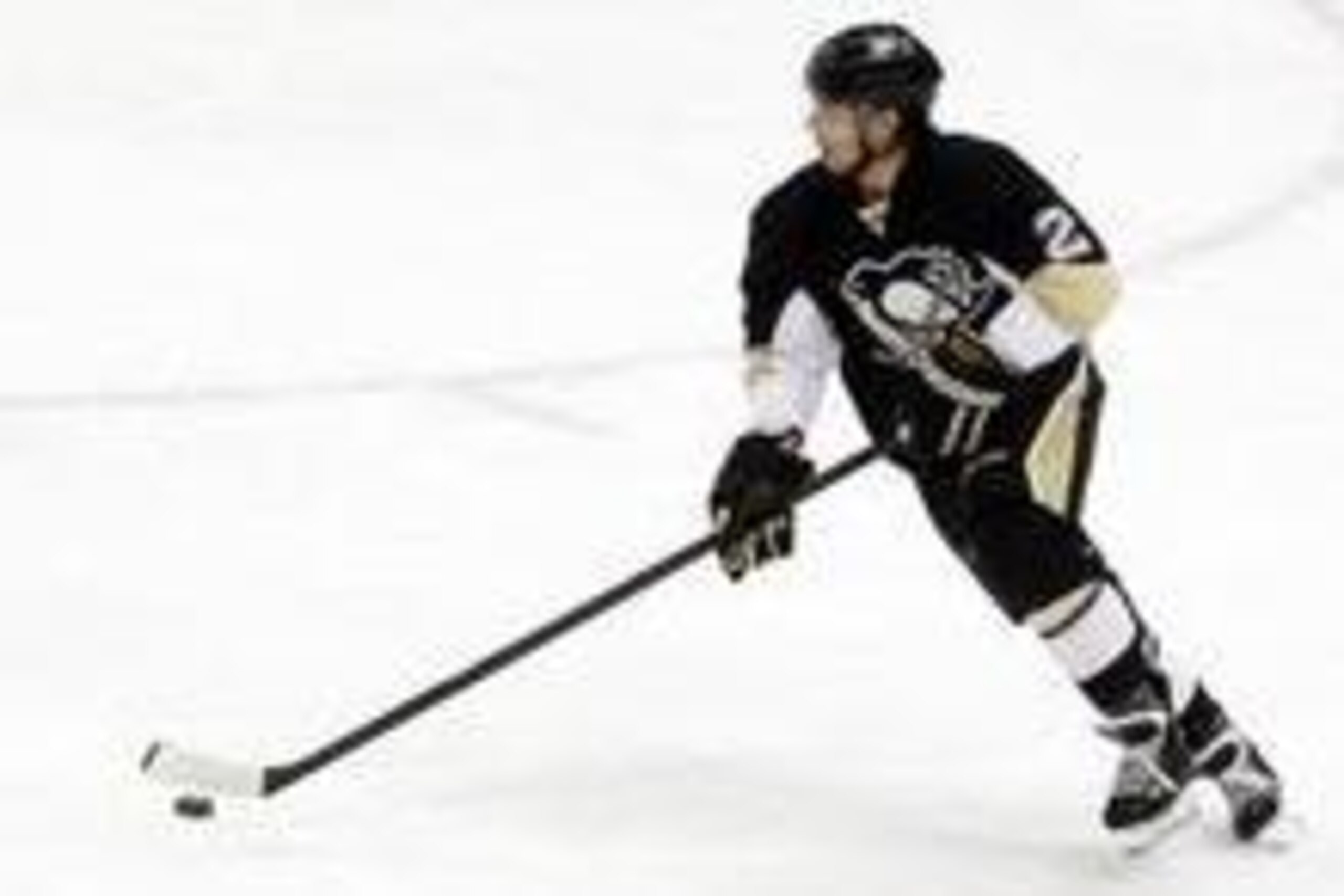 Apr 1, 2014; Pittsburgh, PA, USA; Pittsburgh Penguins defenseman Matt Niskanen (2) skates with the puck against the Carolina Hurricanes during the second period at the CONSOL Energy Center. Carolina won 4-1. Mandatory Credit: Charles LeClaire-USA TODAY Sp