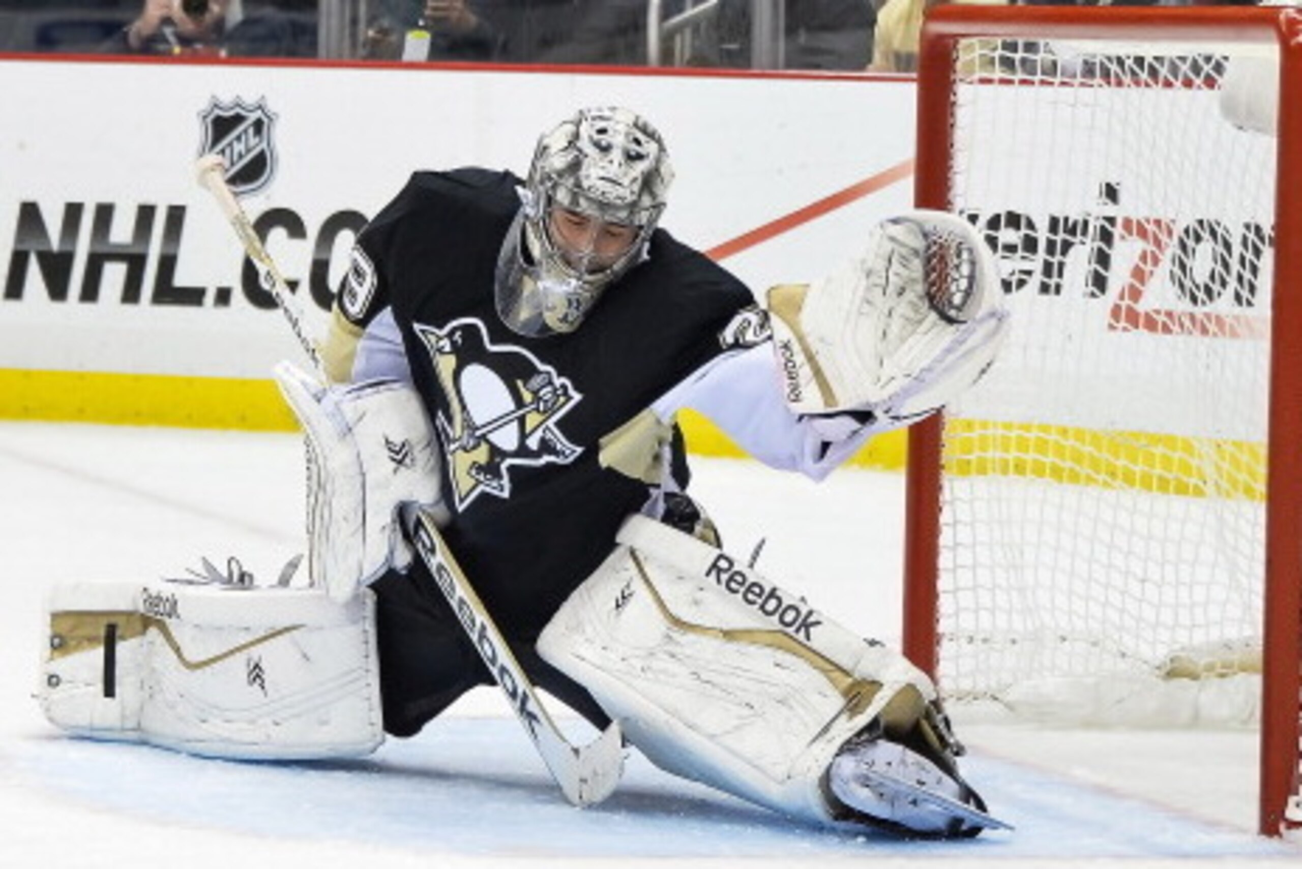 PITTSBURGH, PA - MAY 13:  Goaltender Marc-Andre Fleury #29 of the Pittsburgh Penguins defends the net against the New York Rangers in Game Seven of the Second Round of the 2014 NHL Stanley Cup Playoffs on May 13, 2014 at CONSOL Energy Center in Pittsburgh