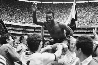 Pele rides on the shoulders of teammates after 4-1 win over Italy in 1970 World Cup final.