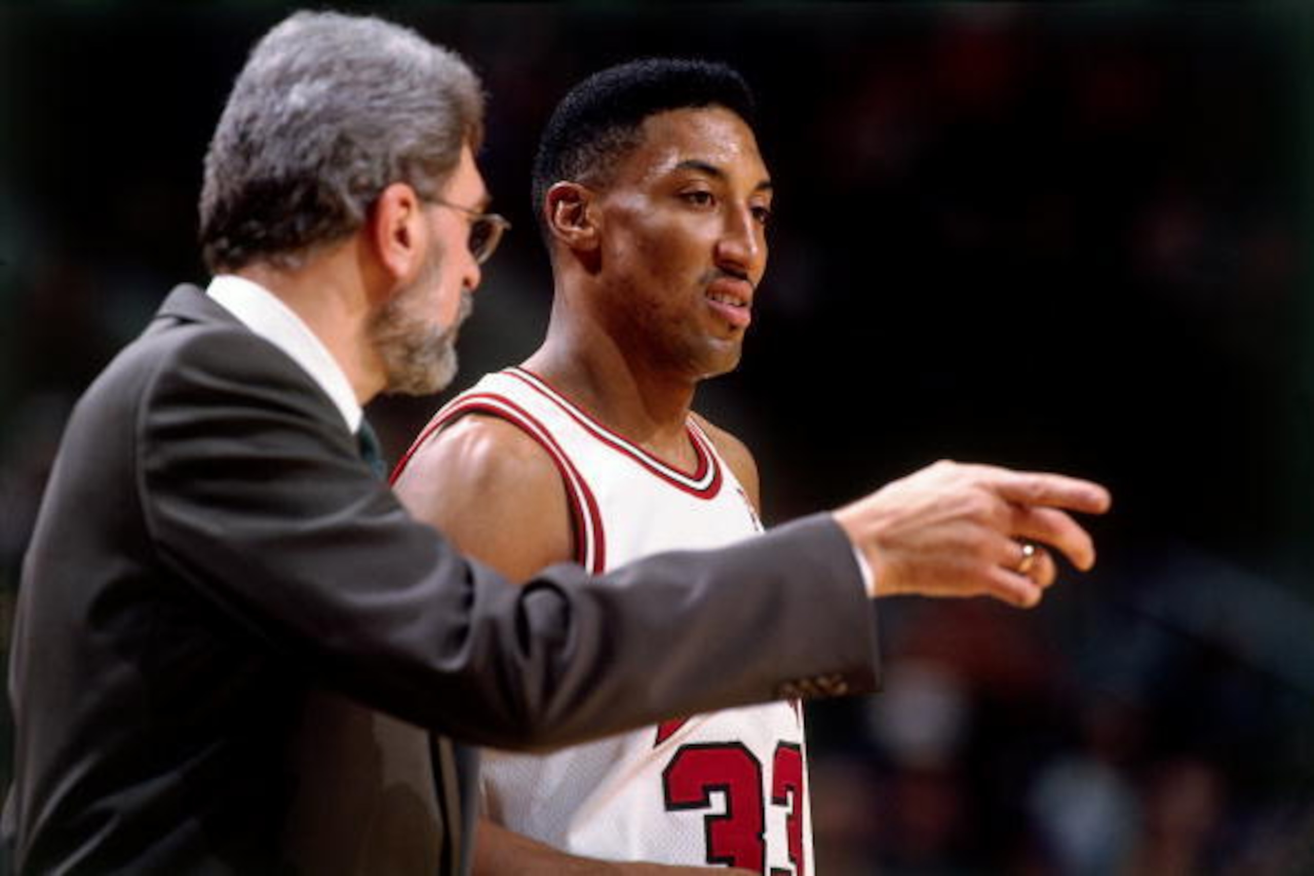 CHICAGO - 1996: Scottie Pippen #33 of the Chicago Bulls discusses strategy with head coach Phil Jackson during a 1996 NBA game at the United Center in Chicago, Illinois. NOTE TO USER: User expressly acknowledges that, by downloading and or using this pho CHICAGO - 1996: Scottie Pippen #33 of the Chicago Bulls discusses strategy with head coach Phil Jackson during a 1996 NBA game at the United Center in Chicago, Illinois. NOTE TO USER: User expressly acknowledges that, by downloading and or using this pho
