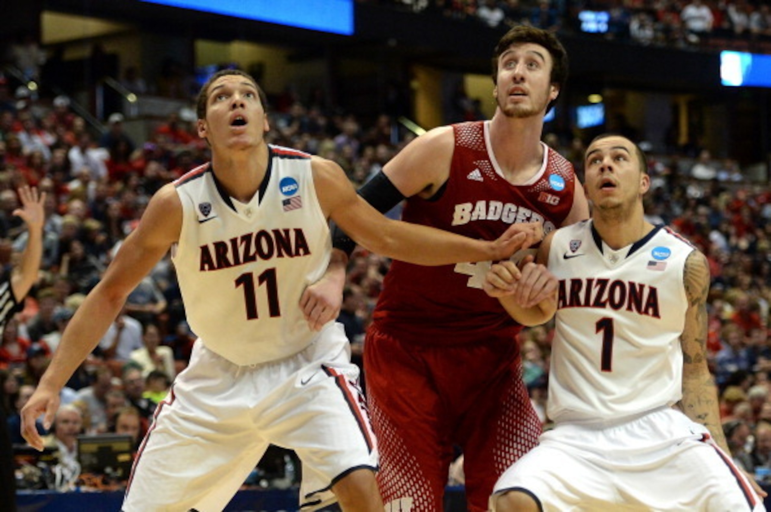 ANAHEIM, CA - MARCH 29:  Aaron Gordon #11 and Gabe York #1 of the Arizona Wildcats box out Frank Kaminsky #44 of the Wisconsin Badgers in the second half during the West Regional Final of the 2014 NCAA Men's Basketball Tournament at the Honda Center on Ma