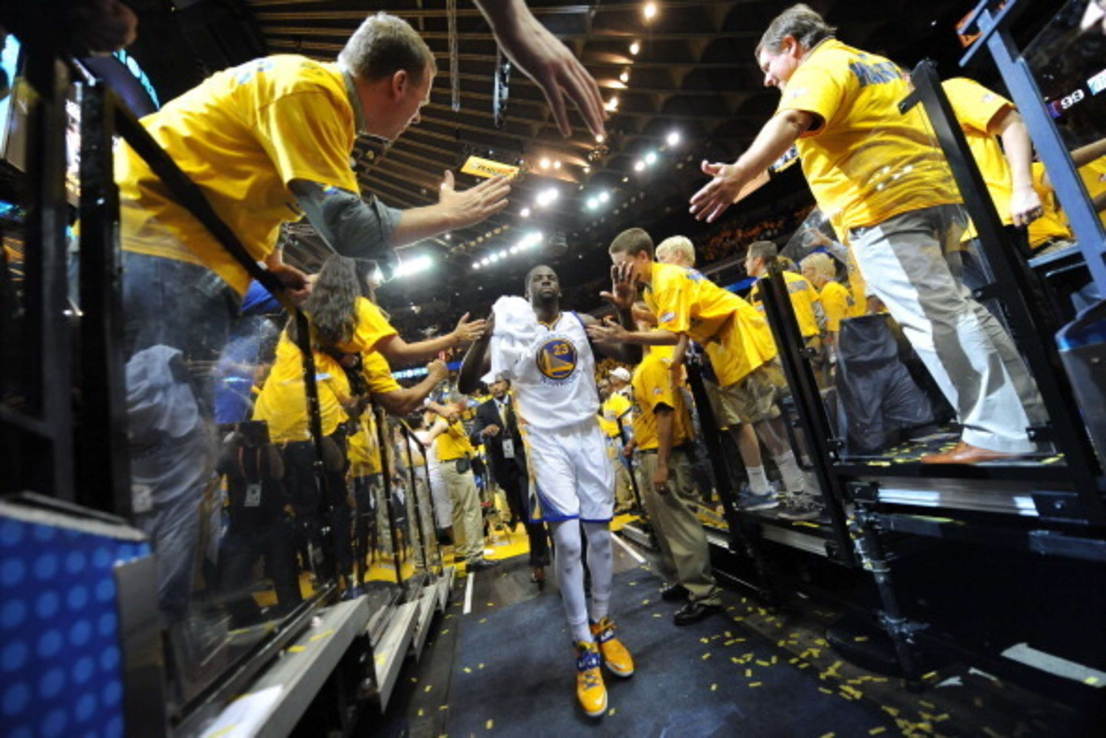 OAKLAND, CA - MAY 1: Draymond Green #23 of the Golden State Warriors leaves the arena after winning against the Los Angeles Clippers in Game Six of the Western Conference Quarterfinals during the NBA Playoffs at Oracle Arena on May 1, 2014 in Oakland, Cal