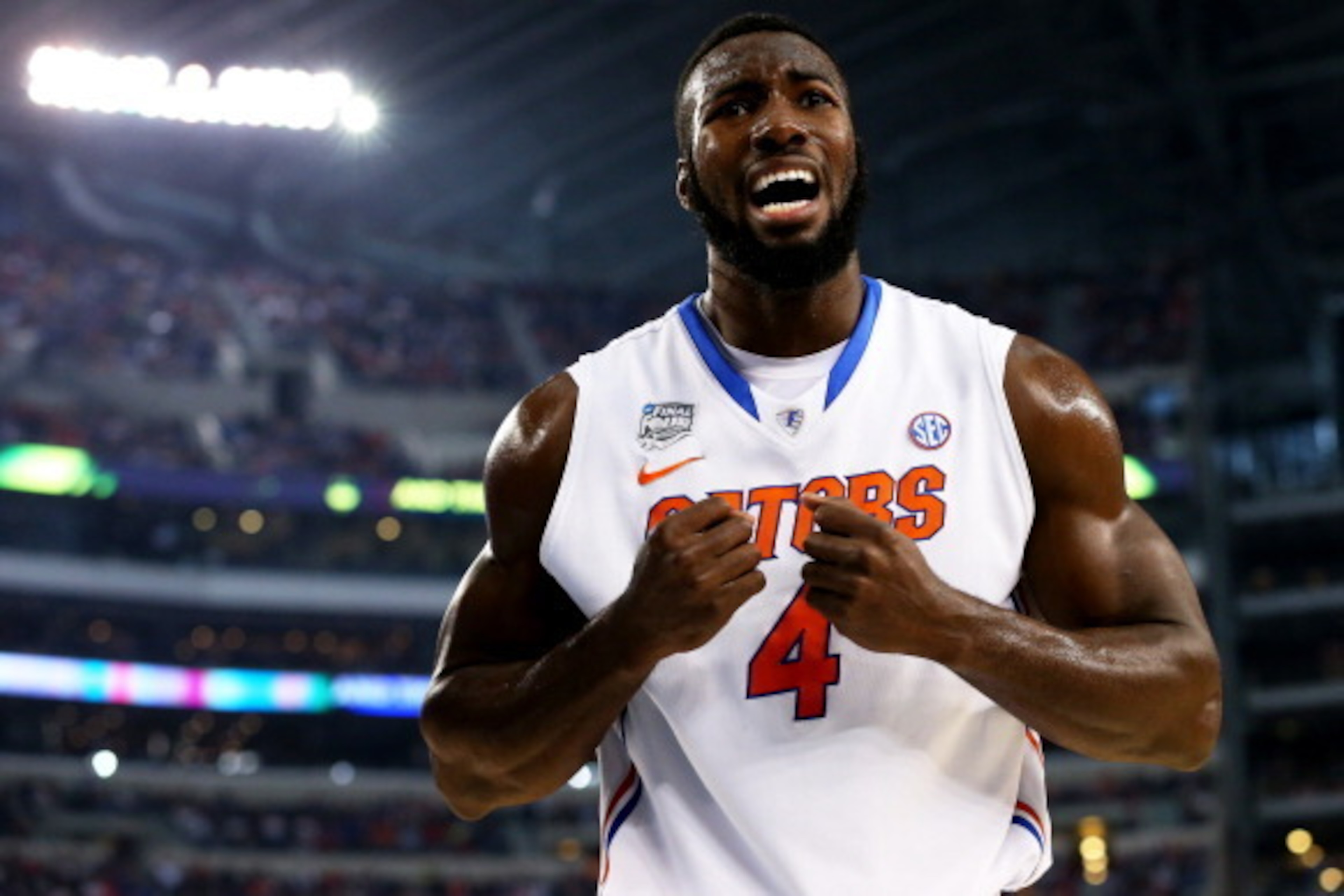 ARLINGTON, TX - APRIL 05: Patric Young #4 of the Florida Gators reacts against the Connecticut Huskies during the NCAA Men's Final Four Semifinal at AT&T Stadium on April 5, 2014 in Arlington, Texas.  (Photo by Ronald Martinez/Getty Images)