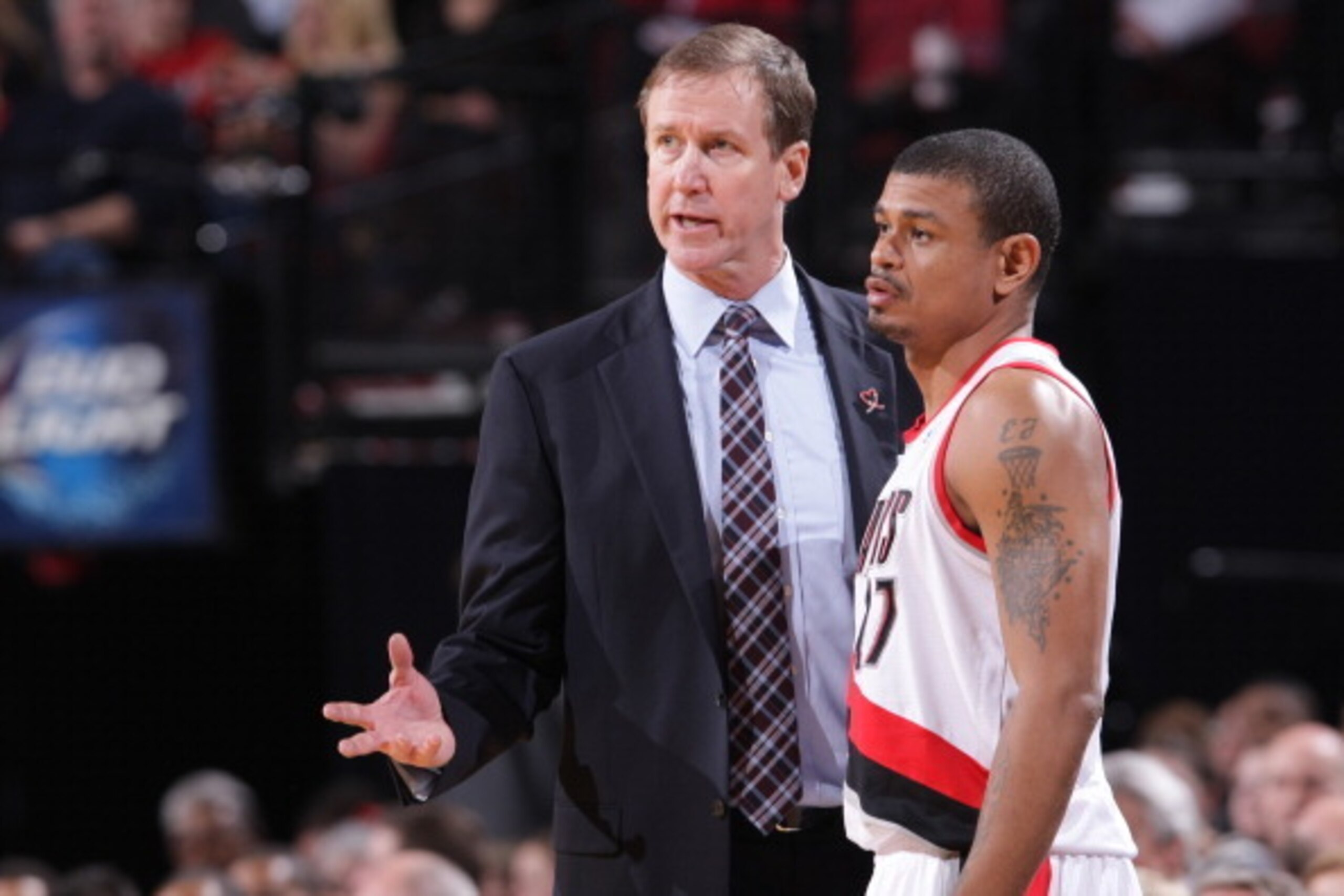 PORTLAND, OR - FEBRUARY 11:  Terry Stotts talks to Earl Watson #17 of the Portland Trail Blazers during the game against the Oklahoma City Thunder on February 11, 2014 at the Moda Center Arena in Portland, Oregon. NOTE TO USER: User expressly acknowledges