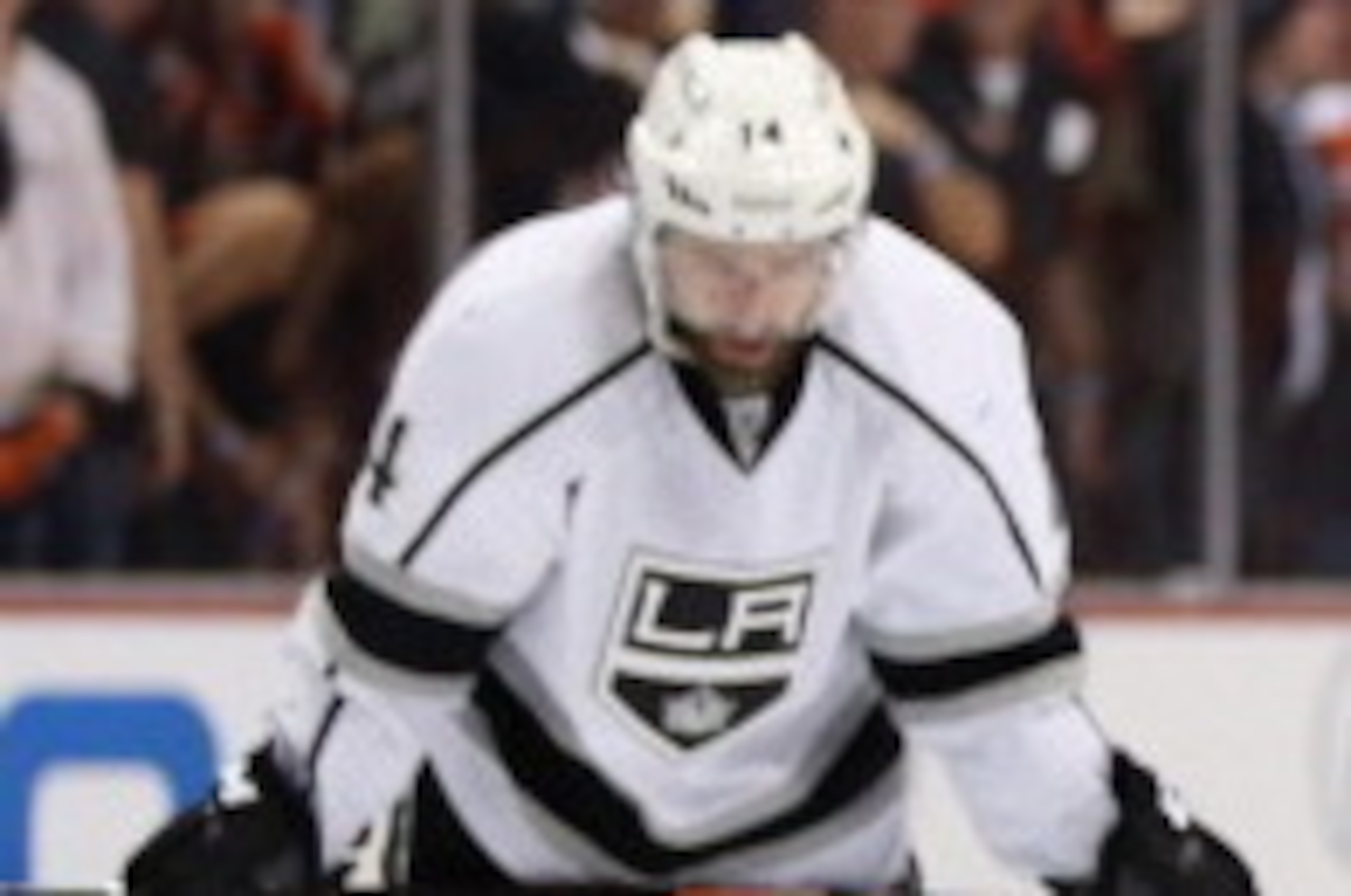 ANAHEIM, CA - MAY 12:  Justin Williams (L) #14 and Dustin Brown #23 of the Los Angeles Kings look down following the Kings' 3-4 loss to the Anaheim Ducks in Game Five of the Second Round of the 2014 NHL Stanley Cup Playoffs at Honda Center on May 12, 2014