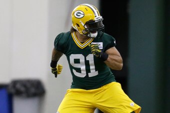 GREEN BAY, WI - MAY 16: Carl Bradford #91 of the Green Bay Packers runs through some drills during rookie minicamp at Don Hudson Center on May 16, 2014 in Green Bay, Wisconsin. (Photo by Mike McGinnis/Getty Images)