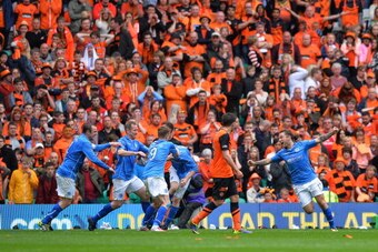 GLASGOW, SCOTLAND - MAY 17 :  Steven Anderson of St Johnstone celebrates scoring with his team mates during The William Hill Scottish Cup Final between St Johnstone and Dundee United at Celtic Park Stadium on May 17, 2014 in Glasgow Scotland. (Photo by Ma