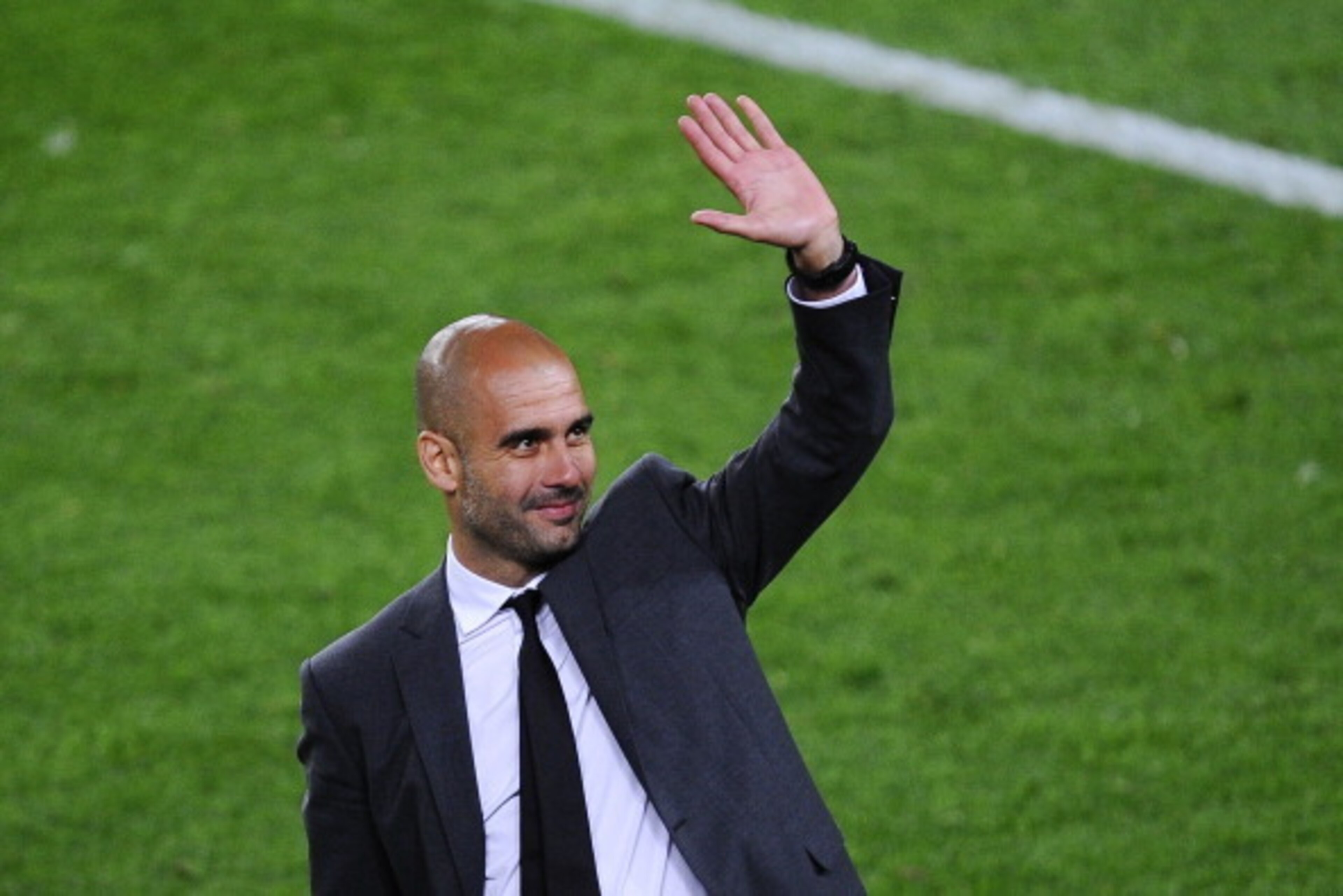 BARCELONA, SPAIN - MAY 05:  Head coach Josep Guardiola of FC Barcelona acknowledge the fans at the end of the La Liga match between FC Barcelona and RCD Espanyol at Camp Nou on May 5, 2012 in Barcelona, Spain. This is Guardiola's last match.  (Photo by Da