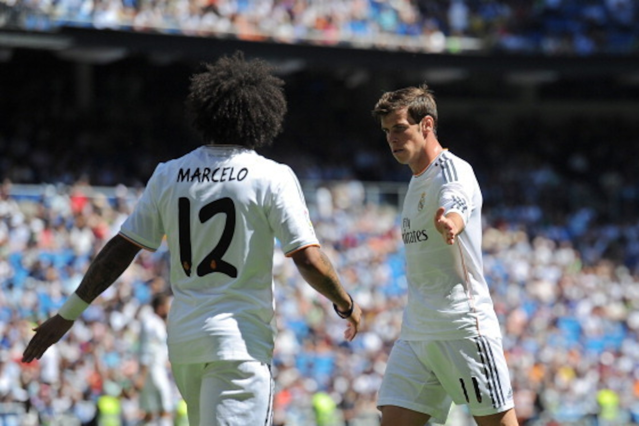 MADRID, SPAIN - MAY 17: Gareth Bale of Real Madrid CF reacts with Marcelo during the La Liga match between Real Madrid CF and RCD Espanyol at Santiago Bernabeu stadium on May 17, 2014 in Madrid, Spain. (Photo by Denis Doyle/Getty Images) MADRID, SPAIN - MAY 17: Gareth Bale of Real Madrid CF reacts with Marcelo during the La Liga match between Real Madrid CF and RCD Espanyol at Santiago Bernabeu stadium on May 17, 2014 in Madrid, Spain. (Photo by Denis Doyle/Getty Images)
