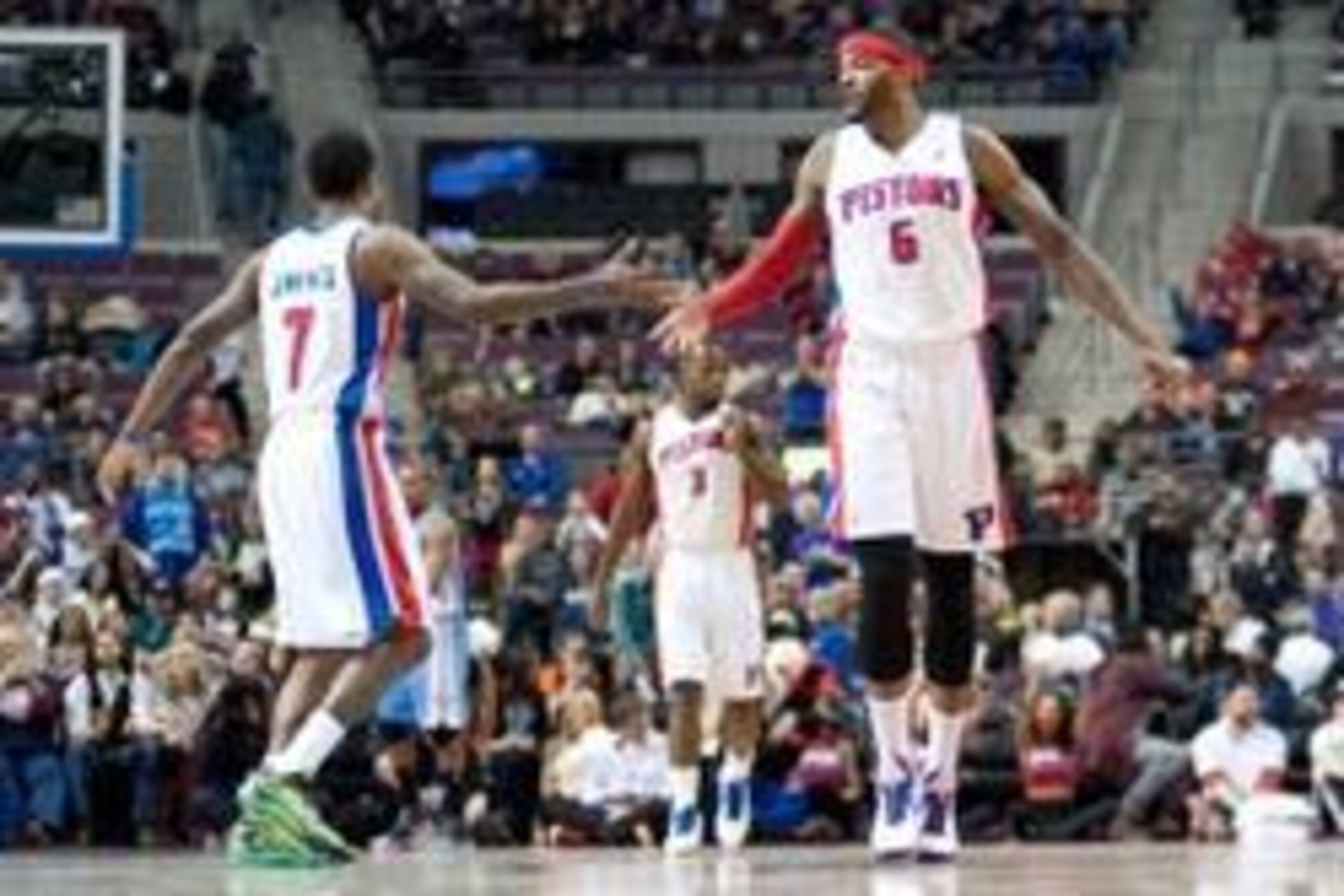 Feb 8, 2014; Auburn Hills, MI, USA; Detroit Pistons small forward Josh Smith (6) high fives point guard Brandon Jennings (7) during the fourth quarter against the Denver Nuggets at The Palace of Auburn Hills. Pistons won 126-109. Mandatory Credit: Tim Ful Feb 8, 2014; Auburn Hills, MI, USA; Detroit Pistons small forward Josh Smith (6) high fives point guard Brandon Jennings (7) during the fourth quarter against the Denver Nuggets at The Palace of Auburn Hills. Pistons won 126-109. Mandatory Credit: Tim Ful