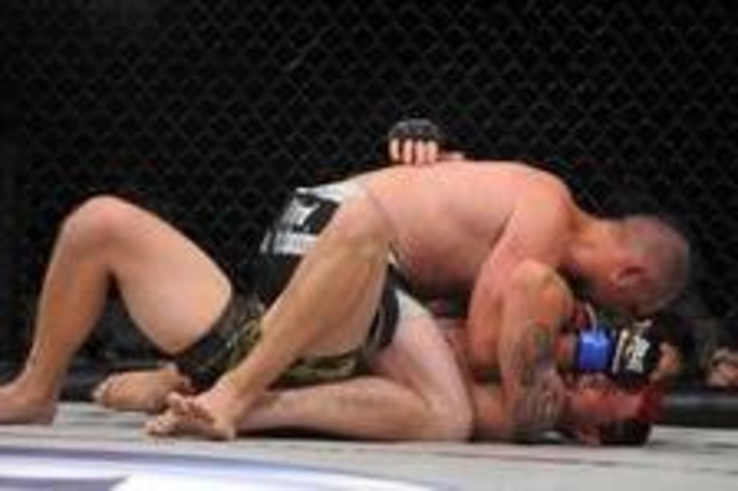 May 17, 2014; Southaven, MS, USA; Andy Lemon (blue gloves) fights against Codie Shuffied (red gloves) during a Bellator welterweight bout during BFC 120 at Landers Center. Mandatory Credit: Justin Ford-USA TODAY Sports