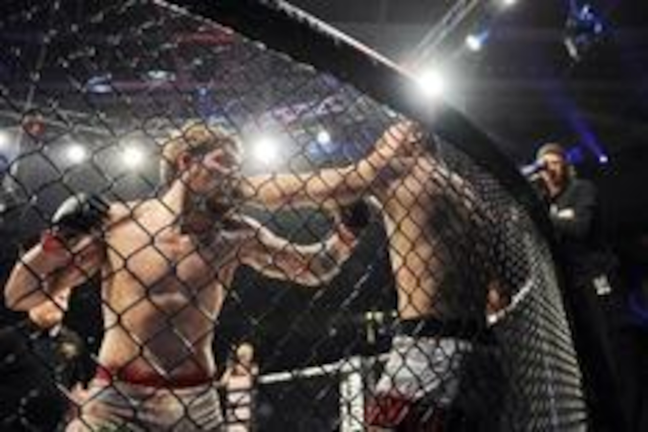 May 17, 2014; Southaven, MS, USA; Ben Brewer (red gloves) fights against Andy Uhrich (blue gloves) during a Bellator welterweight bout during BFC 120 at Landers Center. Mandatory Credit: Justin Ford-USA TODAY Sports